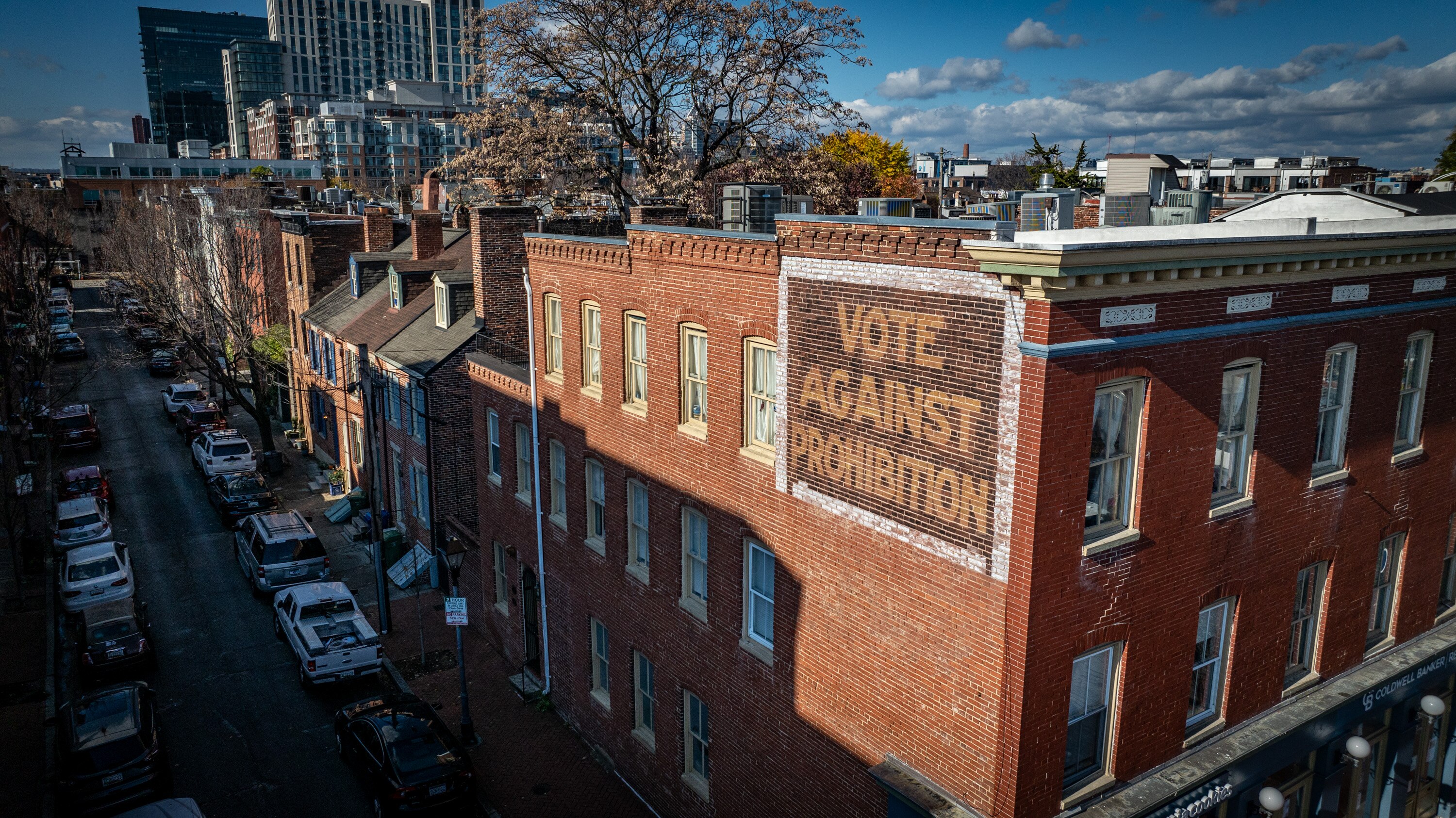 The Society for the Preservation of Federal Hill and Fell’s Point recently used extra money from the Fell’s Point Fun Festival to restore a sign on the side of a building at South Broadway and Shakespeare Street that reads, “VOTE AGAINST PROHIBITION.”