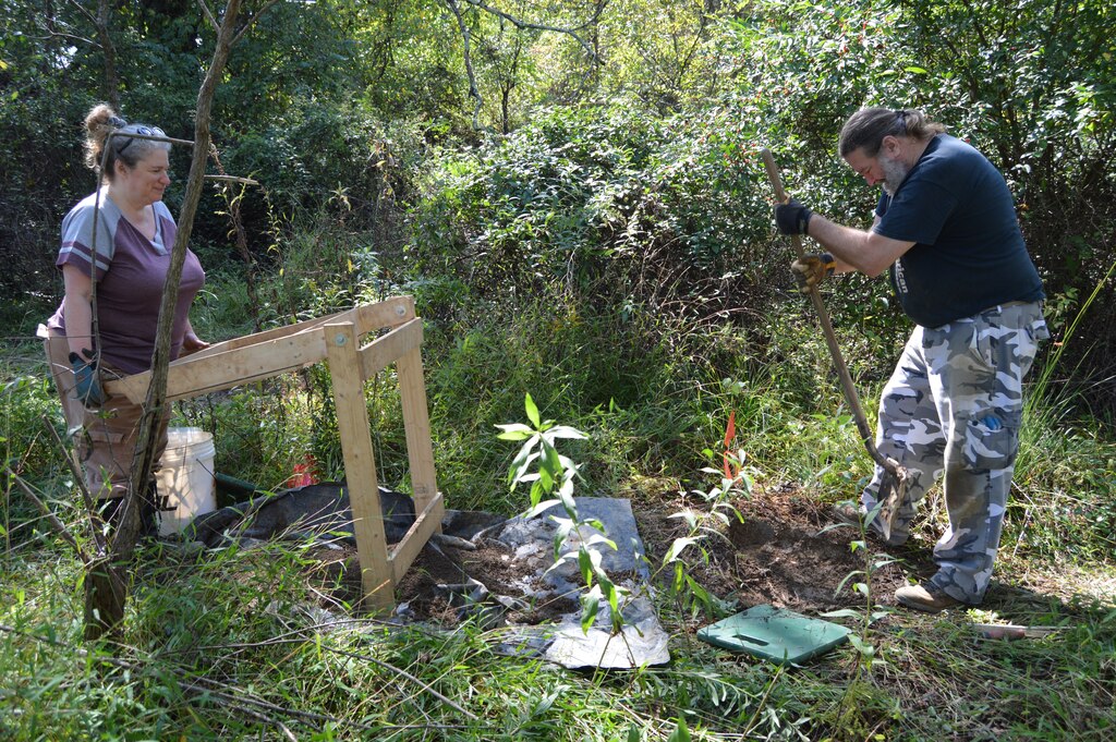 Volunteers excavating a shovel test pit at the Piney Grove site.