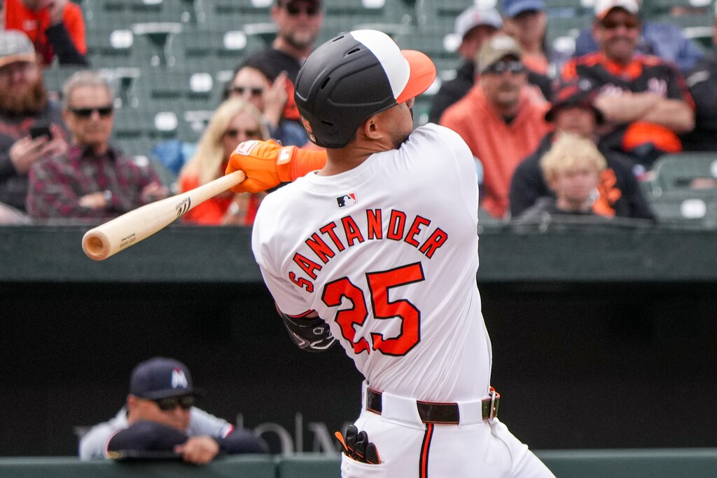 Baltimore Orioles outfielder Anthony Santander (25) hits a home run during game three of a series against the Minnesota Twins at Camden Yards on April 17, 2024. The Orioles won Wednesday, 4-2, to sweep the series against the Twins.