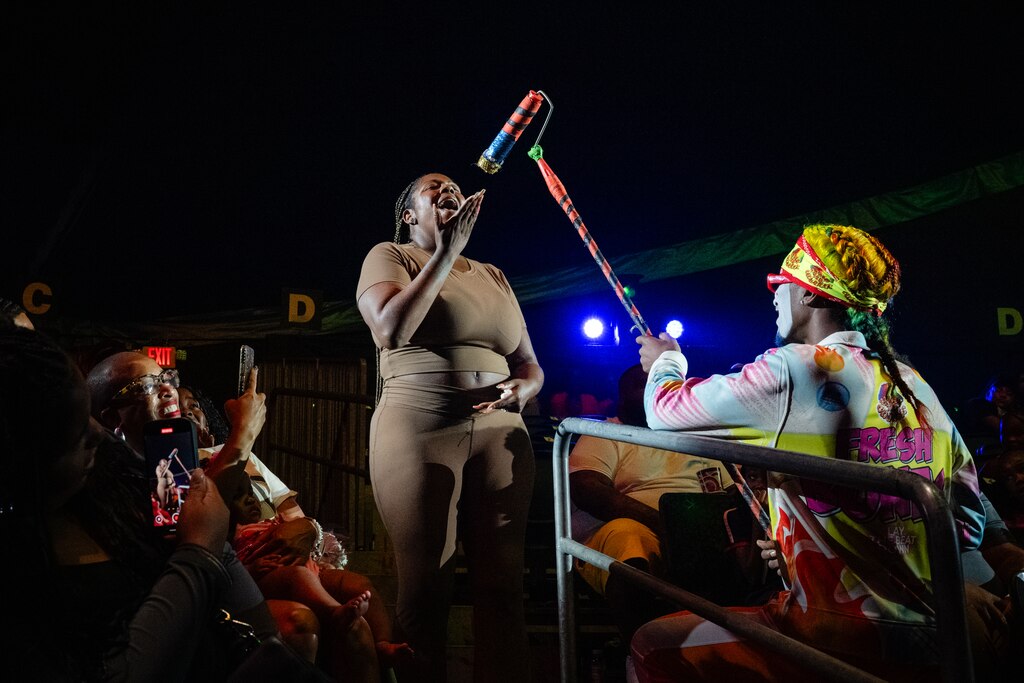 SUNDAY, AUGUST 24TH, 2025 - An audience member lip-synchs during a Fresh the Clownsss act at a UniverSoul Circus show in Baltimore, MD.