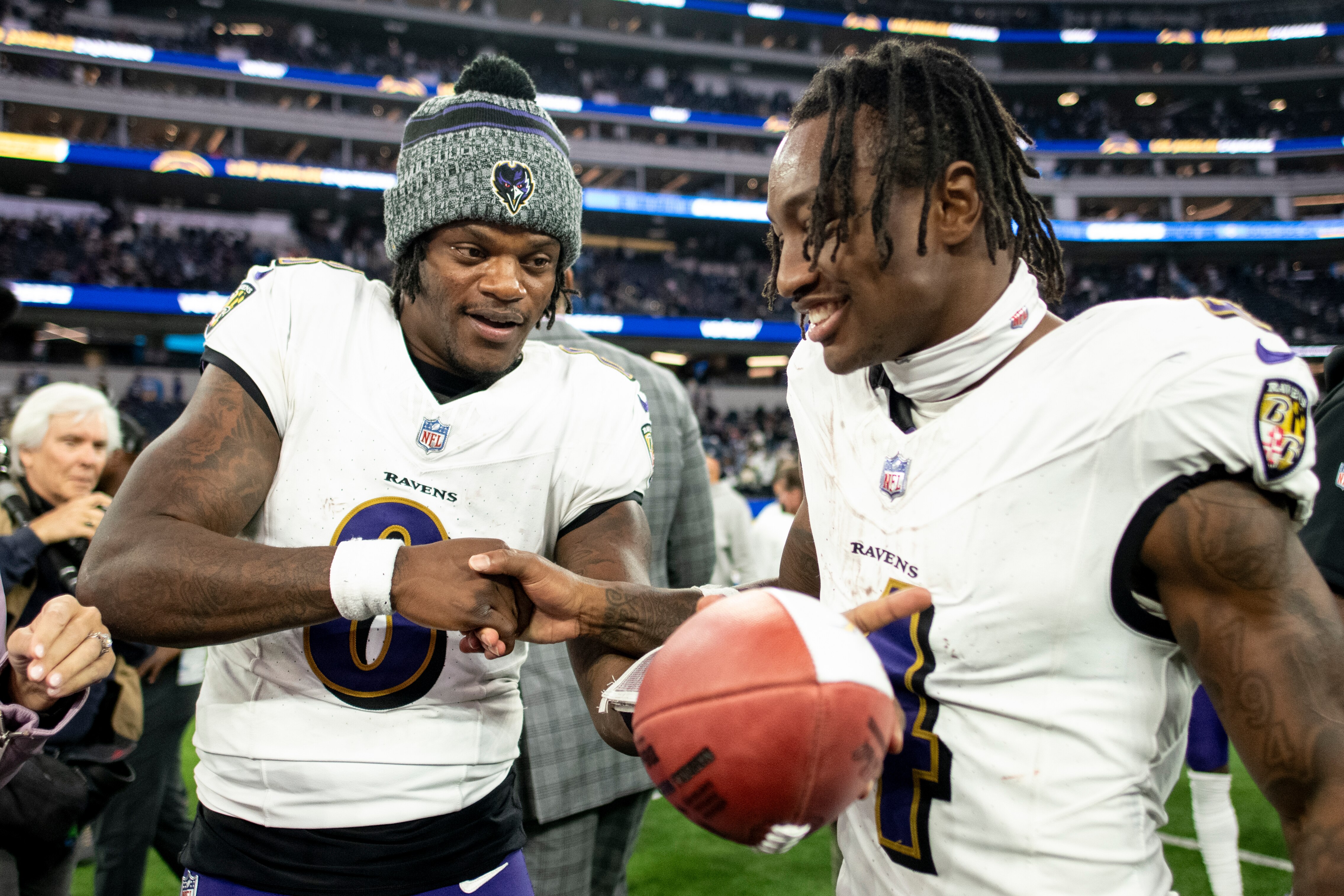 Ravens quarterback Lamar Jackson and wide receiver Zay Flowers celebrate the team's 20-10 win against the Los Angeles Chargers on Sunday night.