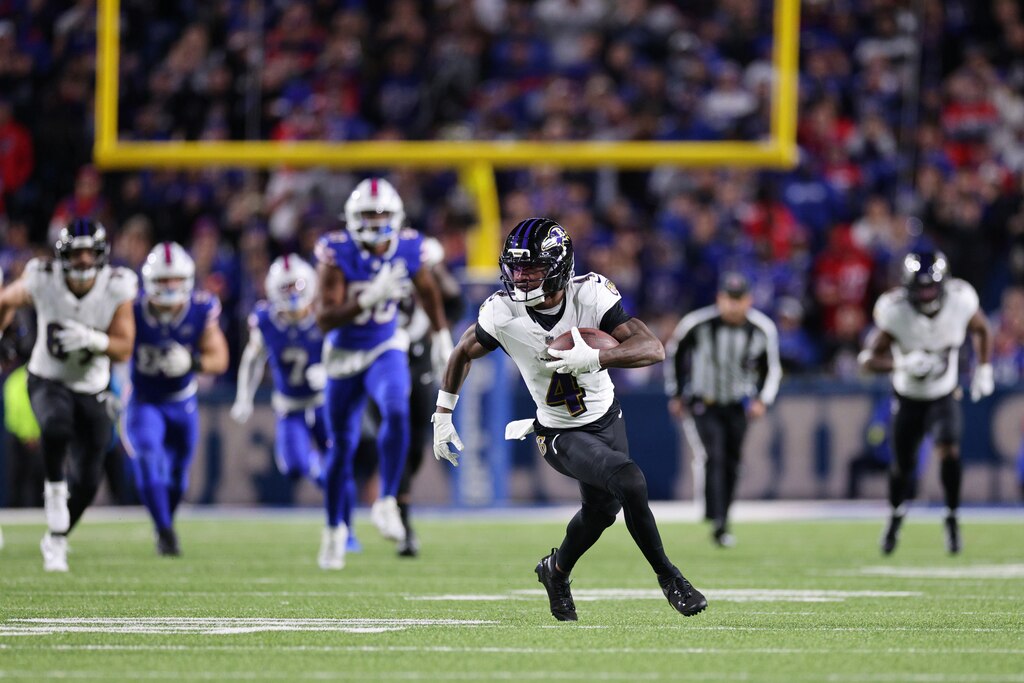 ORCHARD PARK, NEW YORK - SEPTEMBER 07: Zay Flowers #4 of the Baltimore Ravens runs the ball against the Buffalo Bills during the third quarter at Highmark Stadium on September 07, 2025 in Orchard Park, New York.