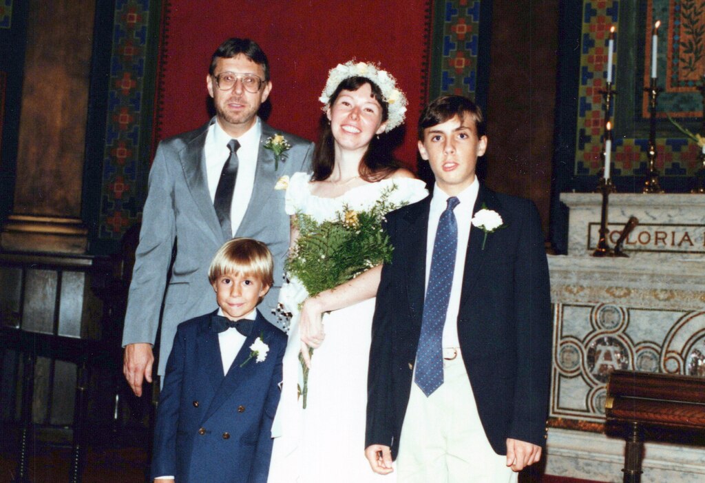 Lee Hudson with his wife Gail Hudson on their wedding day in Saint Mark's Lutheran Church in 1987 with his children, Andrew and Peter Hudson.