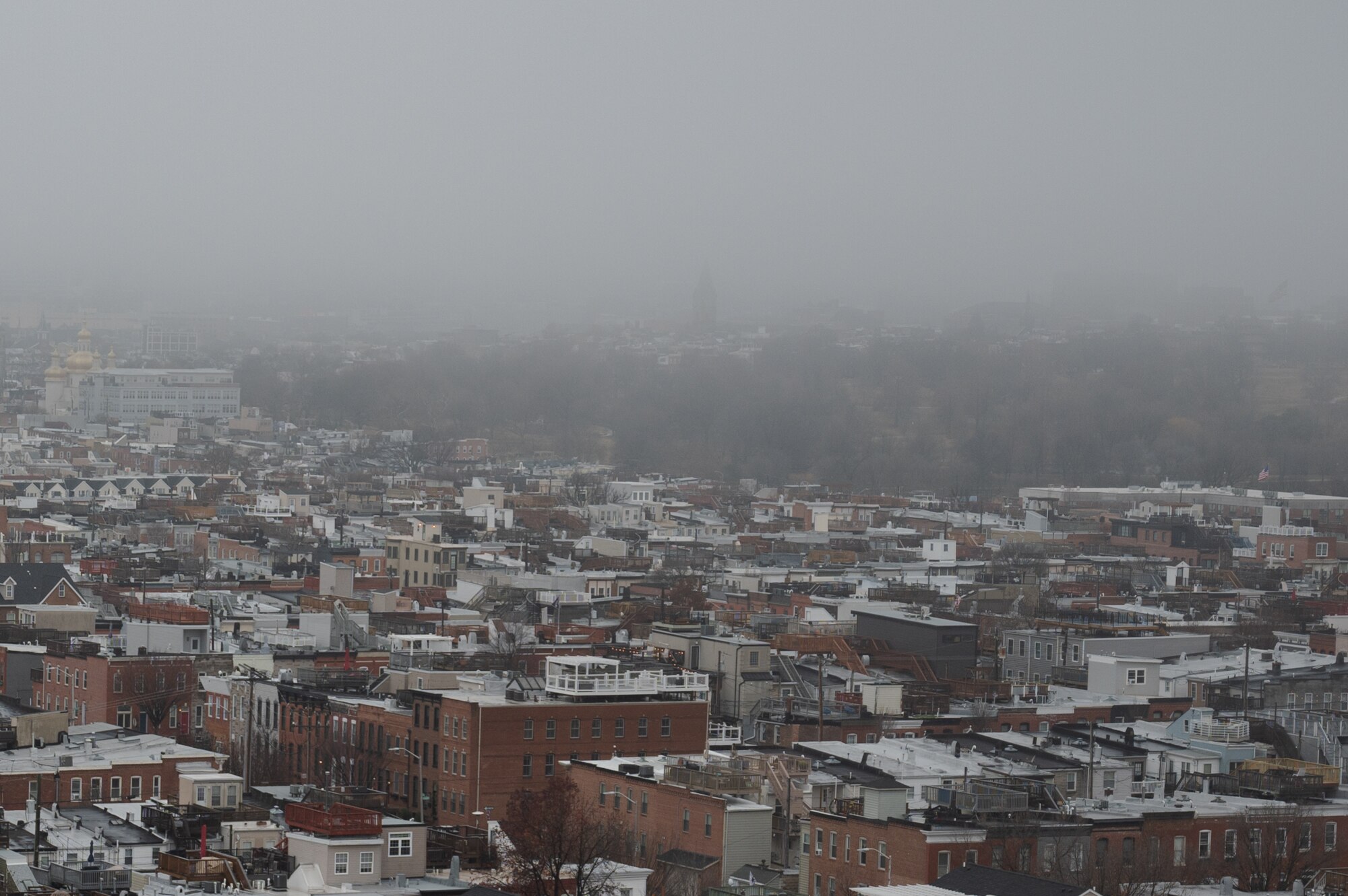 Fog covers Patterson Park on Dec. 27, 2023.