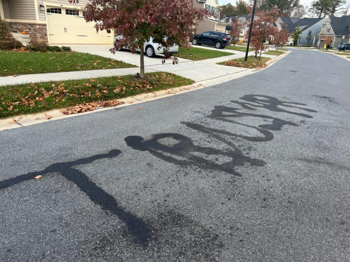 The 36-year-old burned “TRUMP” and “USA” into the asphalt of Hickory Hollow Drive, where he lived. 