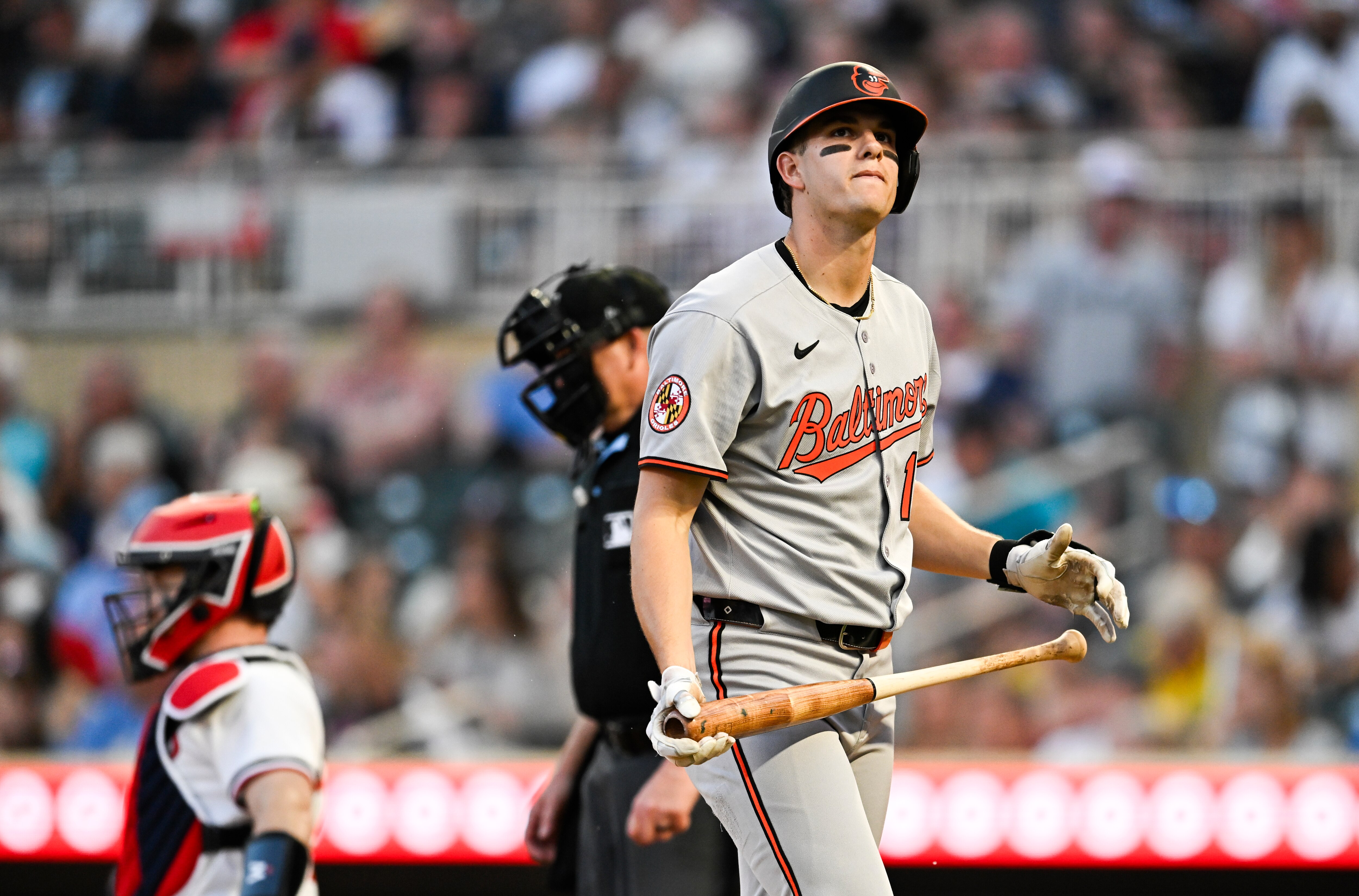 Coby Mayo #16 of the Baltimore Orioles walks back to the dugout after striking out in the fifth inning against the Minnesota Twins at Target Field on May 6, 2025 in Minneapolis, Minnesota.
