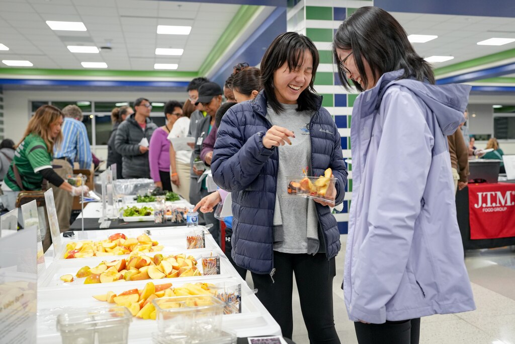Emma Lu, left, and Julia Zhang, 17, make food selections during a taste test of the Howard County Public School System’s school lunch menu at the Guilford Park High School cafeteria in Jessup, Md. on Thursday, November 14, 2024. It was the first time HCPSS Food and Nutrition services has hosted the event, and was open to students, staff and families in the community.