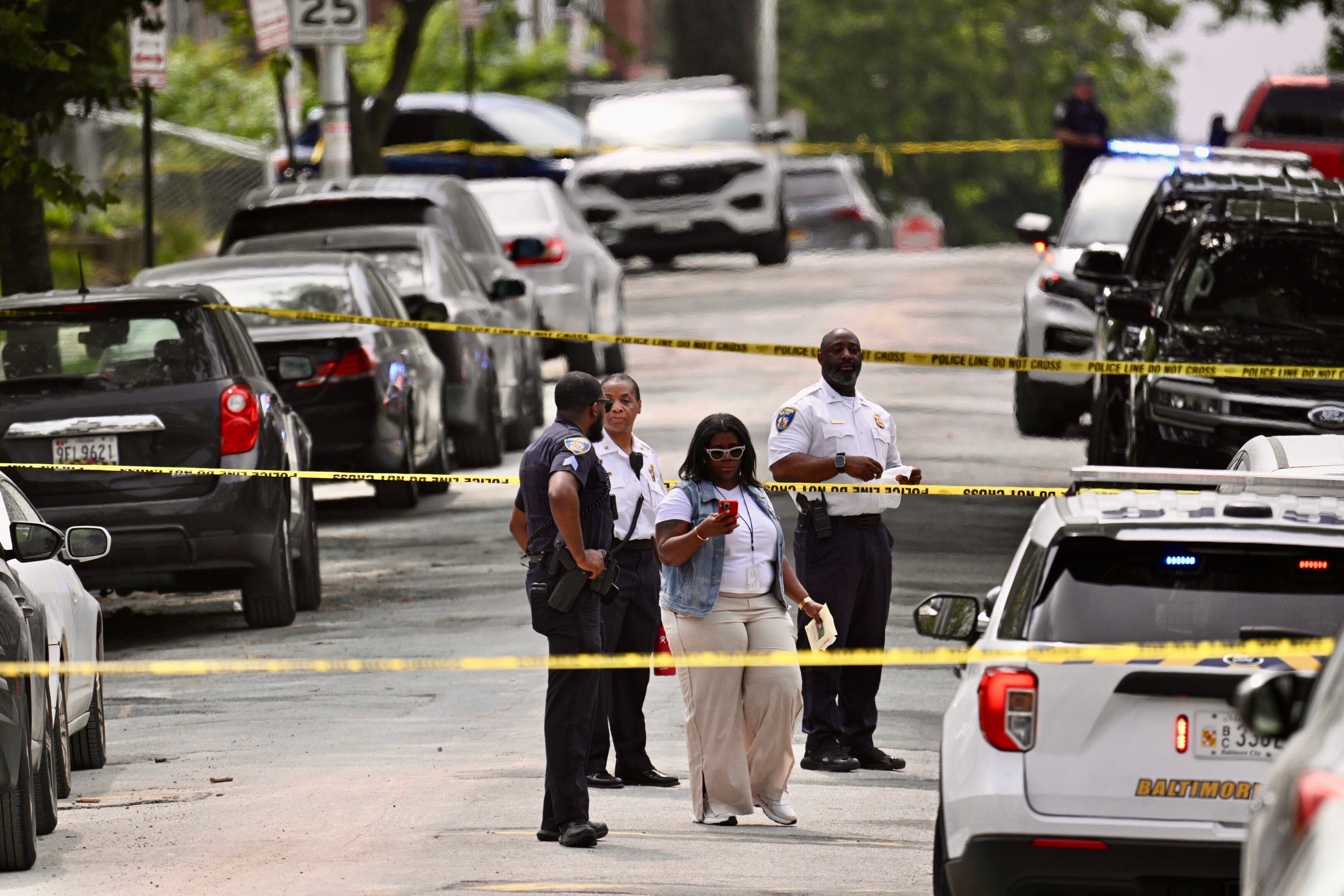Baltimore Police on scene of a police-involved shooting on the 2700 block of Mosher Street on Wednesday, June 25, 2025.
