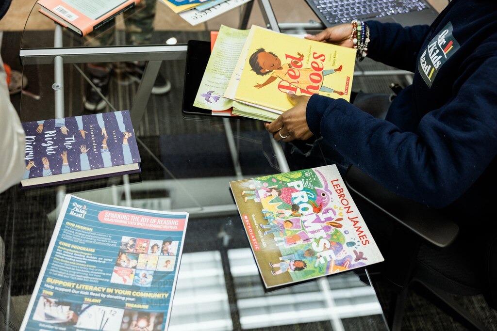 BALTIMORE, MD - FEB 21, 2025: Visitors check out books from Our Kids Read, a free bookstore in Baltimore, Maryland on February 21, 2025.