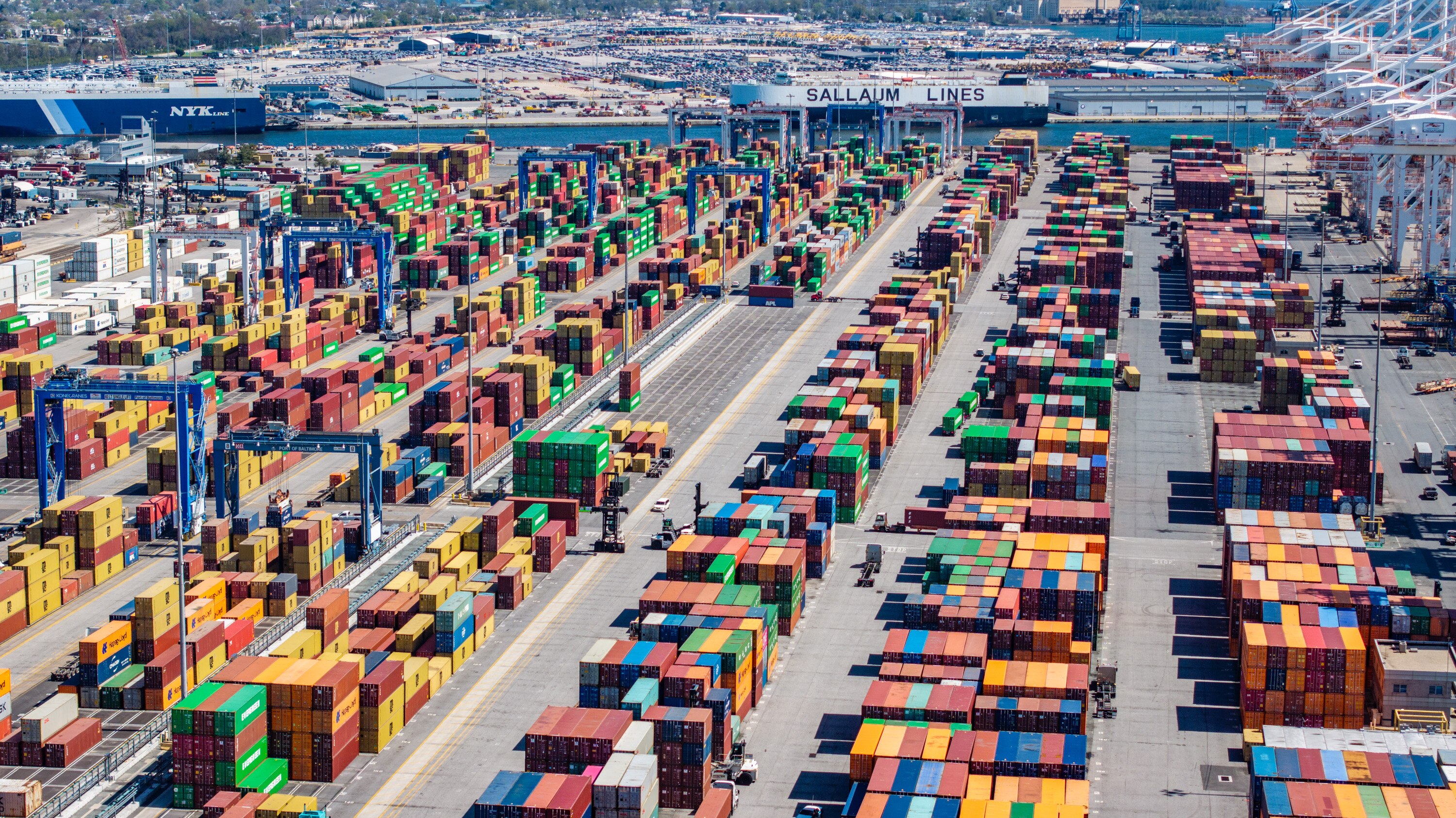 Trucks navigate the container yard at the Port of Baltimore’s Seagirt Marine Terminal on March 19, 2025.