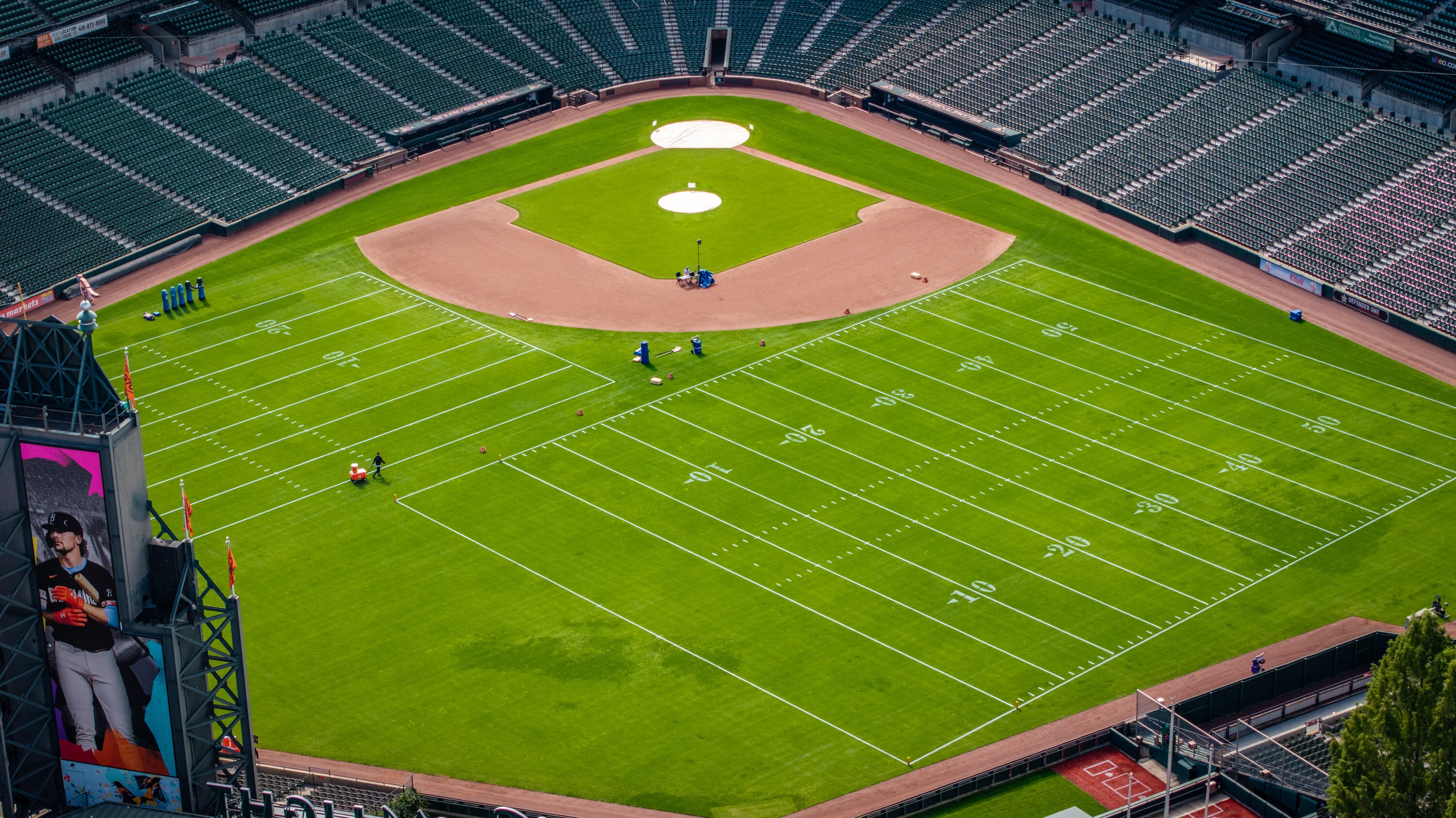 The outfield at Oriole Park has been transformed into a football practice field for the Los Angeles Rams as they prepare for a game this weekend in London.
