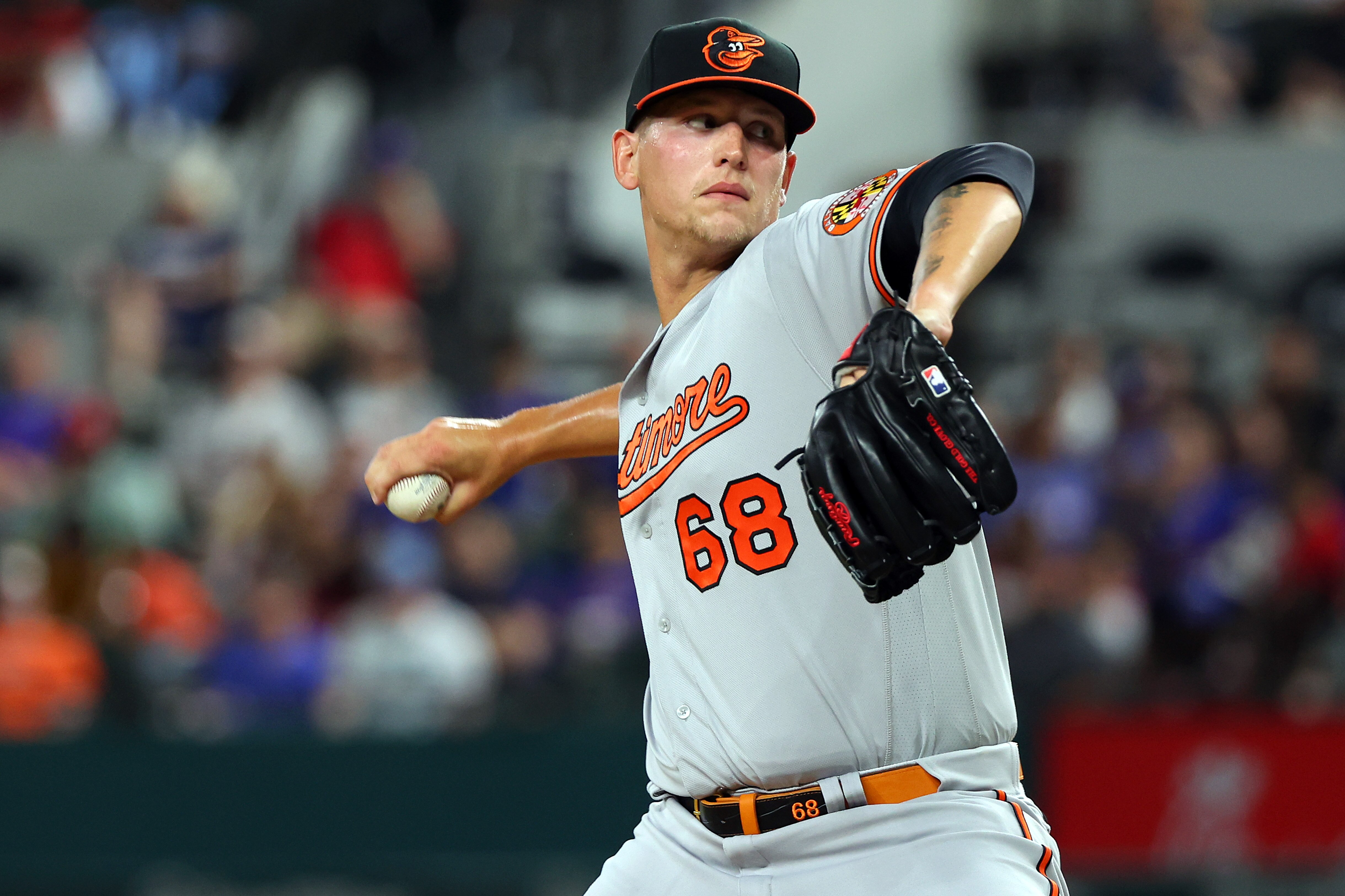 ARLINGTON, TEXAS - APRIL 03: Tyler Wells #68 of the Baltimore Orioles pitches in the fourth inning against the Texas Rangers at Globe Life Field on April 03, 2023 in Arlington, Texas. (Photo by Richard Rodriguez/Getty Images)