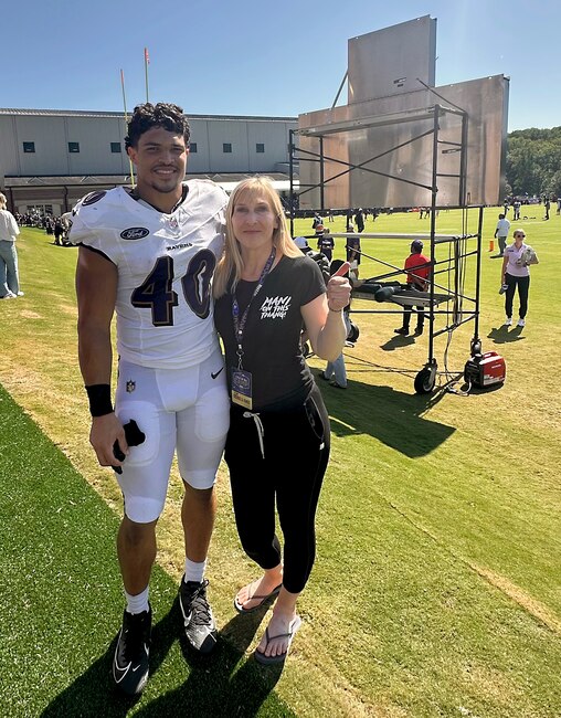 Teddye Buchanan and his mom, Kim, at Ravens training camp.