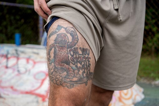 Wednesday, Aug. 6, 2025 — Nick Beals, a skateboarder, shows off his tattoo honoring Ridge, a former DIY skate spot that was demolished in 2010 at Crackside, a DIY skate spot in Parkville. Baltimore County, Md.