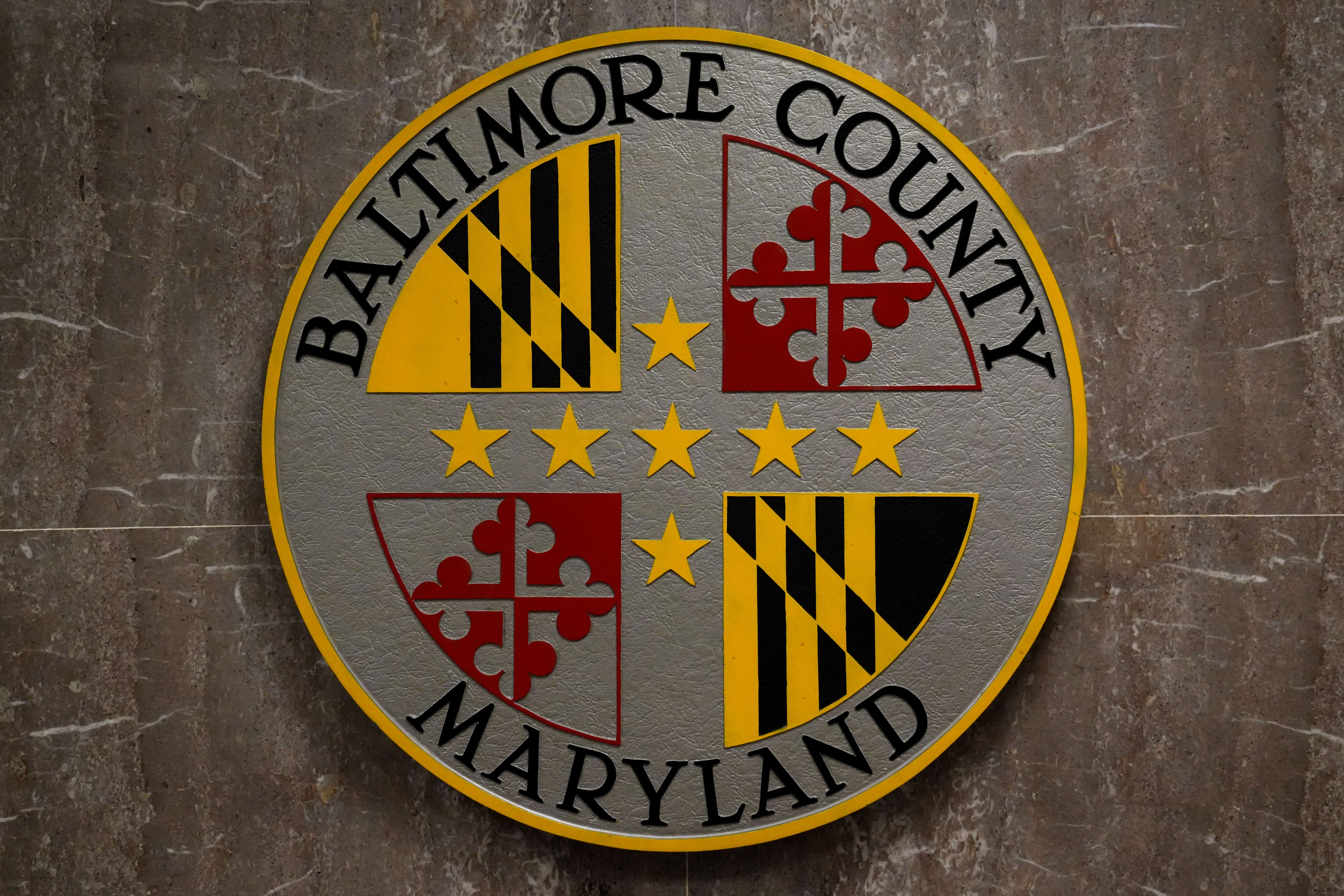 6/16/22—A sign reading “Baltimore County Maryland” hangs on the wall inside the historic Baltimore County Courthouse in Towson, the center of county government.