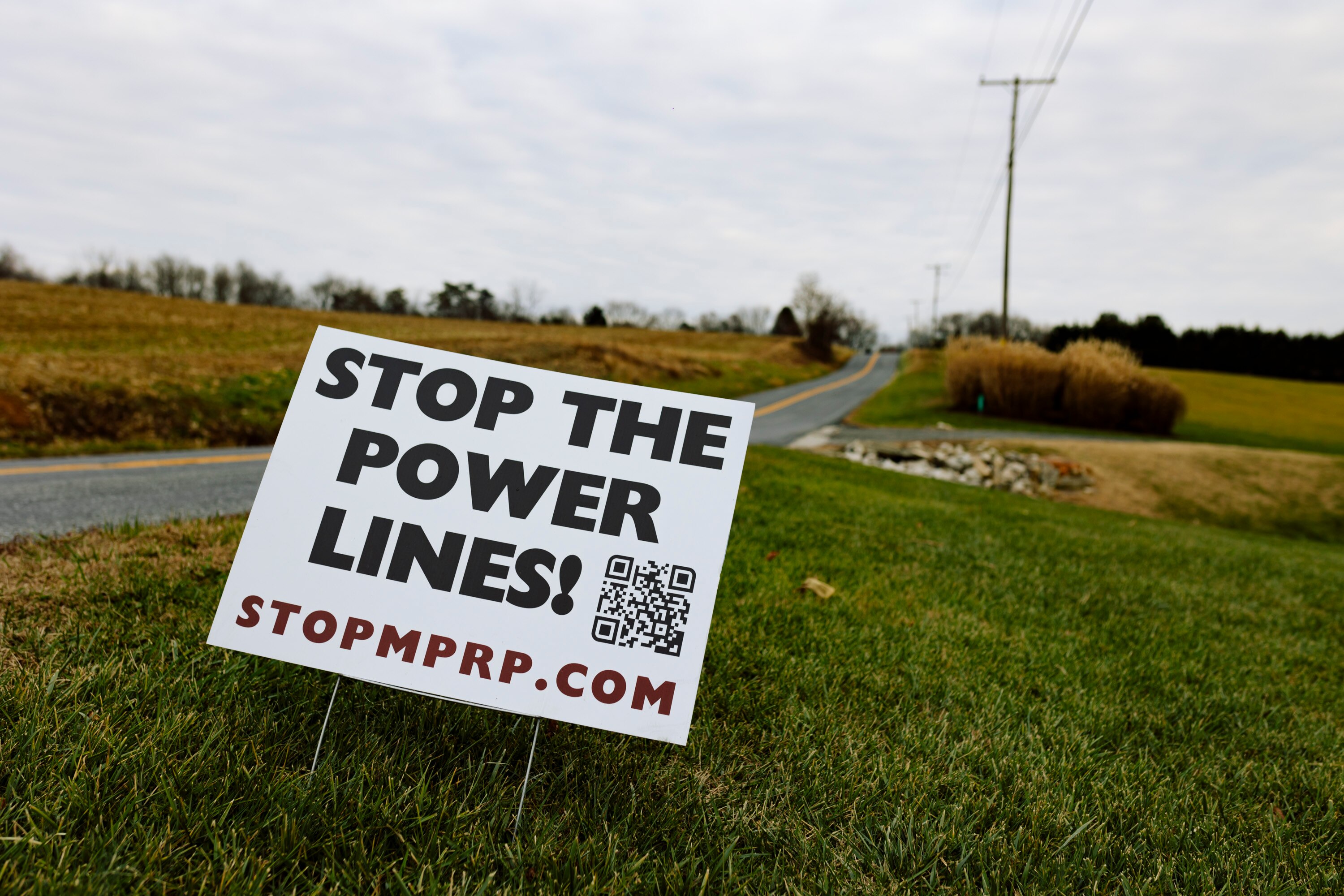 A sign protesting the Maryland Piedmont Reliability Project power line stands in a yard in Parkton, on Friday, Dec. 13, 2024.