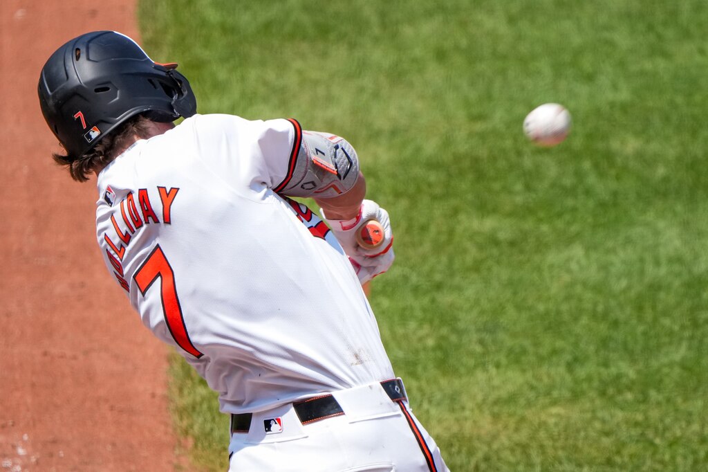 Baltimore Orioles second baseman Jackson Holliday (7) hits a grand slam against the Toronto Blue Jays at Camden Yards on July 31, 2024. It was also his first home run as a Baltimore Oriole. (Ulysses Muñoz/The Baltimore Banner)