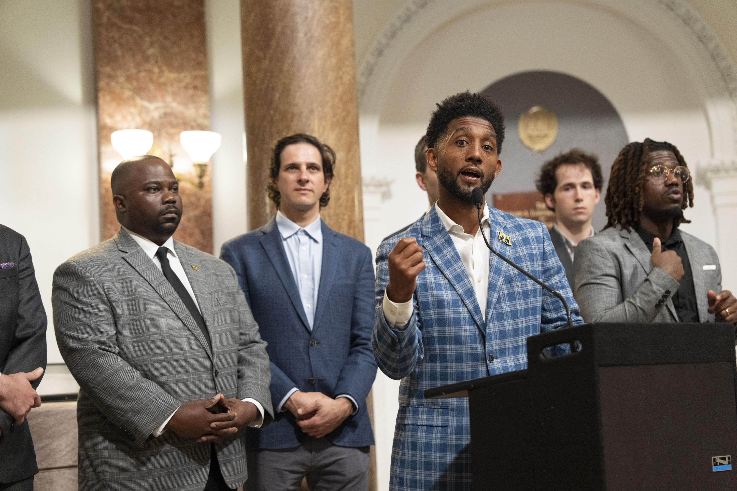 Baltimore Mayor Brandon Scott on Monday signed four housing bills that advocates say will increase housing availability and affordability. 