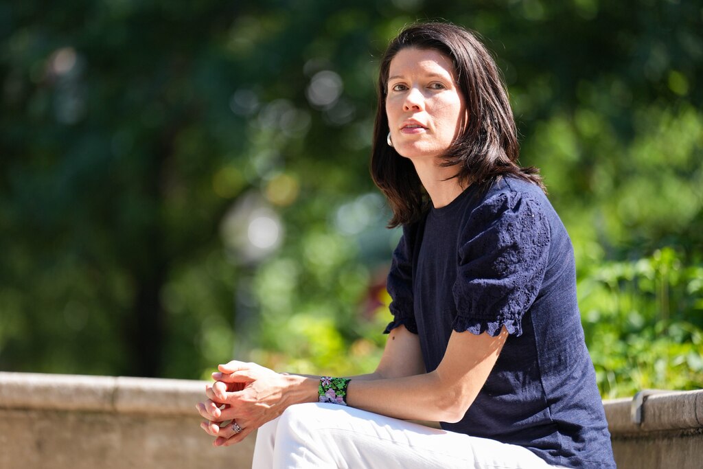 Dr. Tania Caballero sits for a portrait outside of the Enoch Pratt Library Roland Park Branch in Baltimore, Md. on Saturday, July 19, 2025.