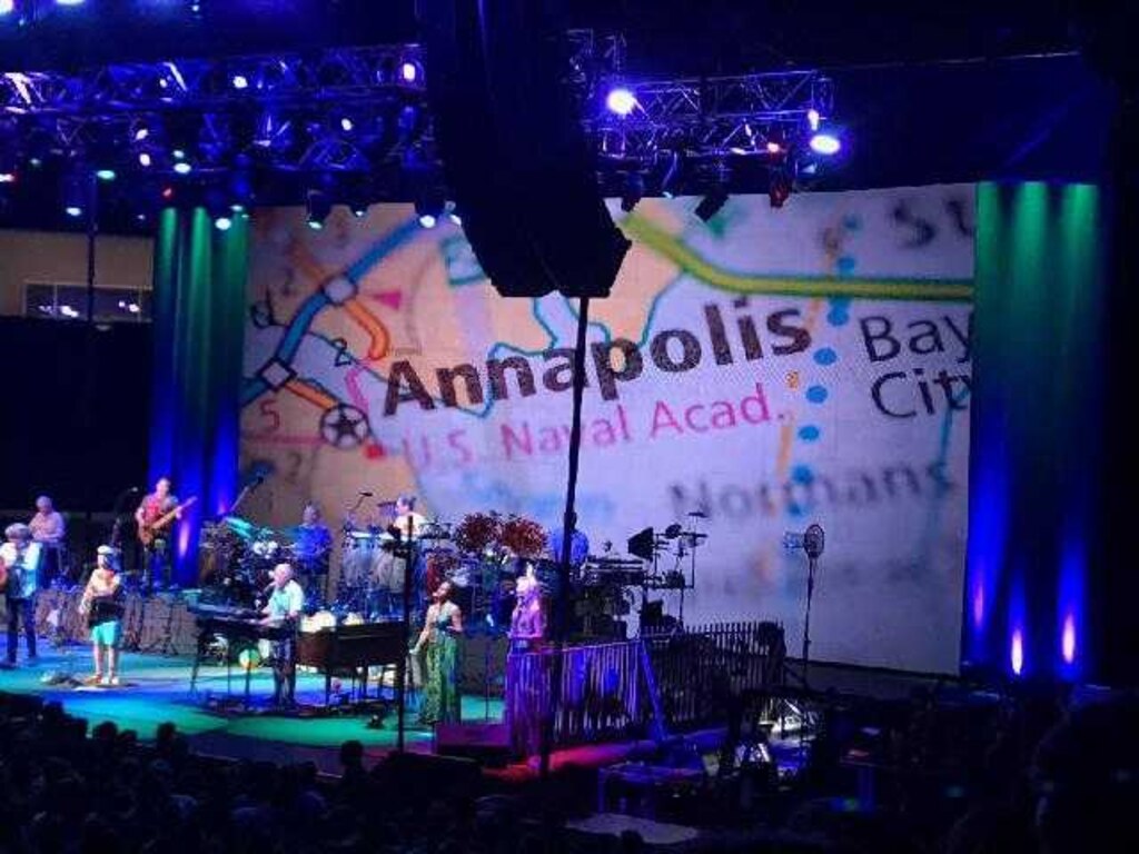 Jimmy Buffett performs for midshipmen at the Naval Academy in 2018. His relationship with retired astronaut Ken Reightler deepened his ties to Annapolis.