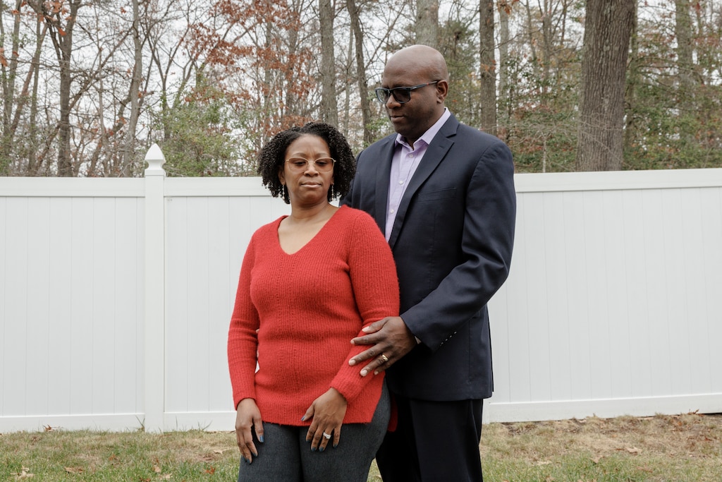 Robert Johnson III poses for a portrait with his wife, Rainey, at their home in Waldorf, Md.,
