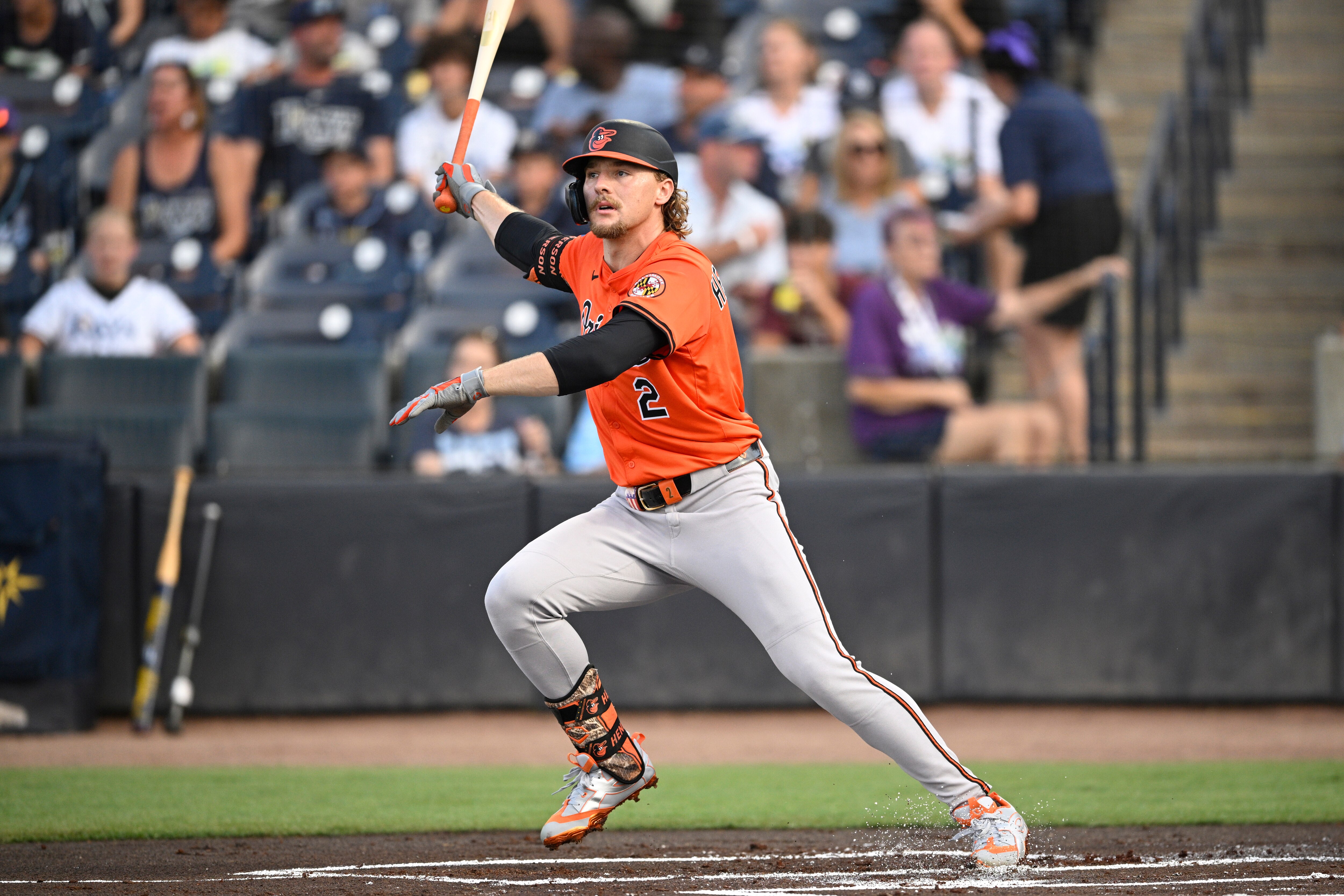 Orioles shortstop Gunnar Henderson watches his sacrifice fly during the first inning Saturday night against the Rays.