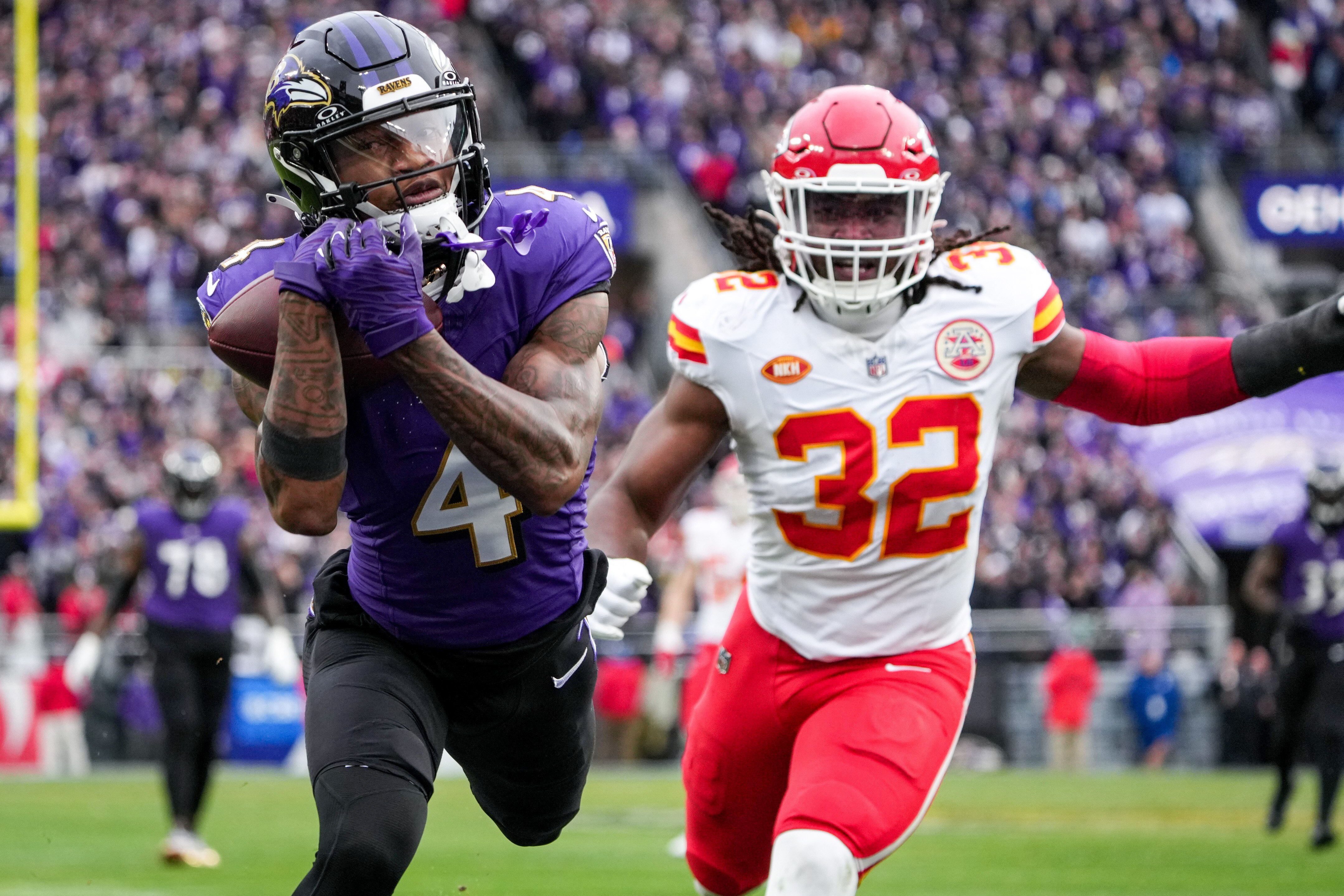 Baltimore Ravens wide receiver Zay Flowers (4) catches a touchdown pass in the first quarter of the AFC Championship game against the Kansas City Chiefs at M&T Bank Stadium on Jan. 28, 2024. The Chiefs beat the Ravens, 17-10, to advance to the Super Bowl.