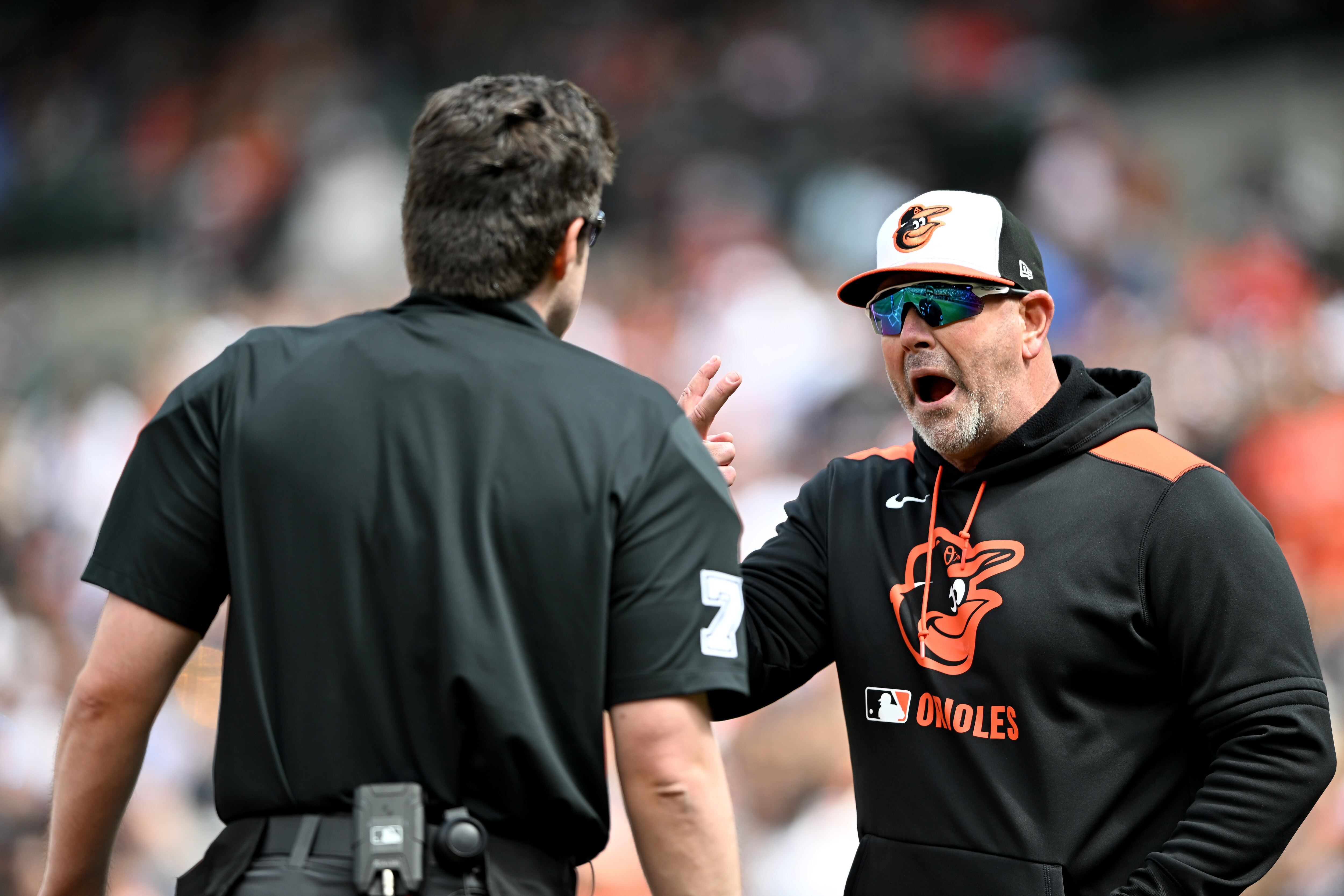 Orioles manager Brandon Hyde argues with home plate umpire John Bacon after being thrown out of the game in the third inning of a 7-6, 10-inning loss to Toronto.