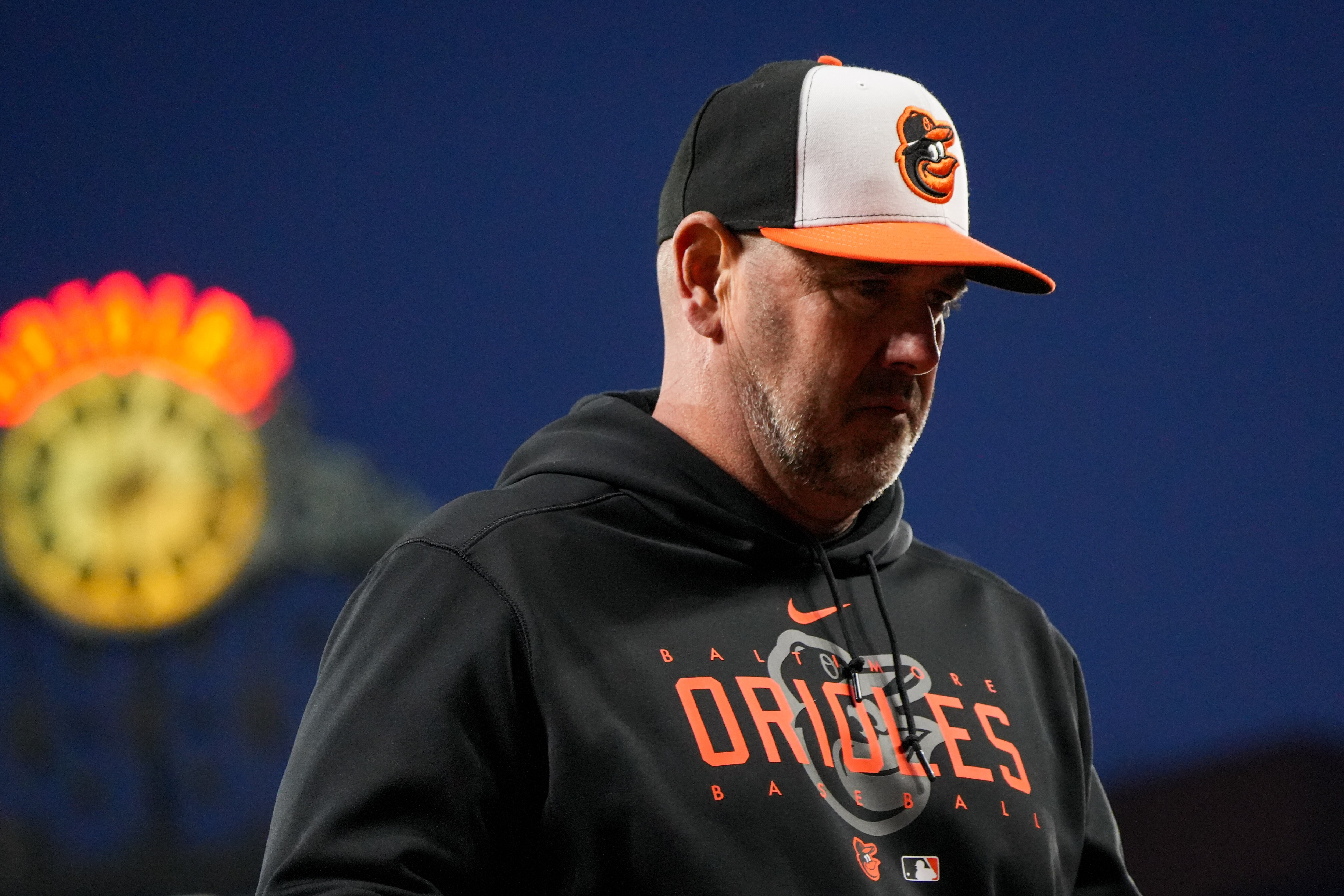 Baltimore Orioles manager Brandon Hyde returns to the dugout after benching starting pitcher Dean Kremer in the sixth inning of a baseball game at Camden Yards on Monday, April 24. The Orioles beat the Red Sox, 5-4, in the first game of the series.