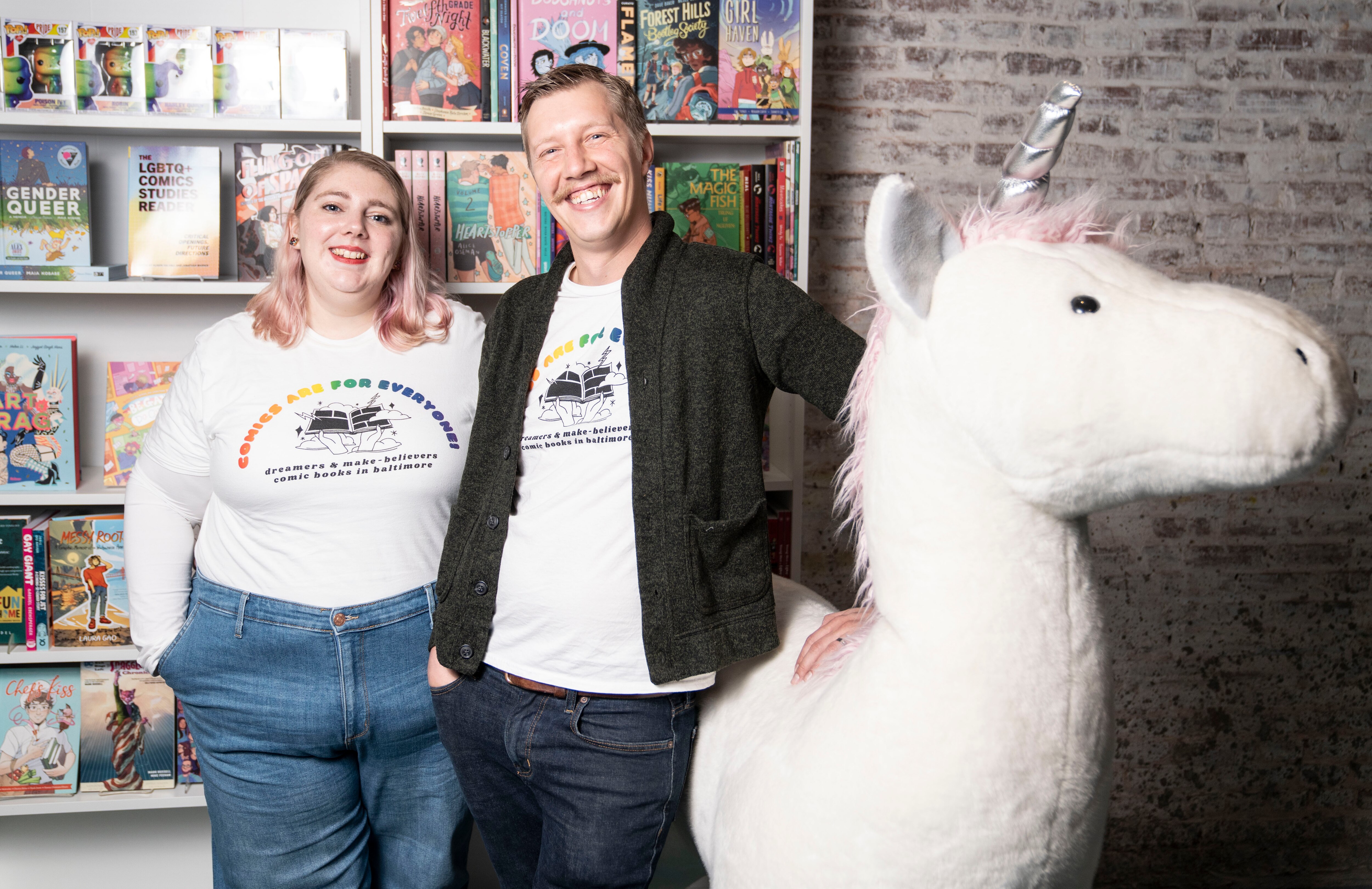Miranda Nordell owner, Head Dreamer at Dreamers & Make-Believers and Sam Bolenbaugh, Head Make-Believer at Dreamers & Make-Believers poses for a portrait inside of their store, Dreamers and Make-Believers, Friday, November 11, 2022.
