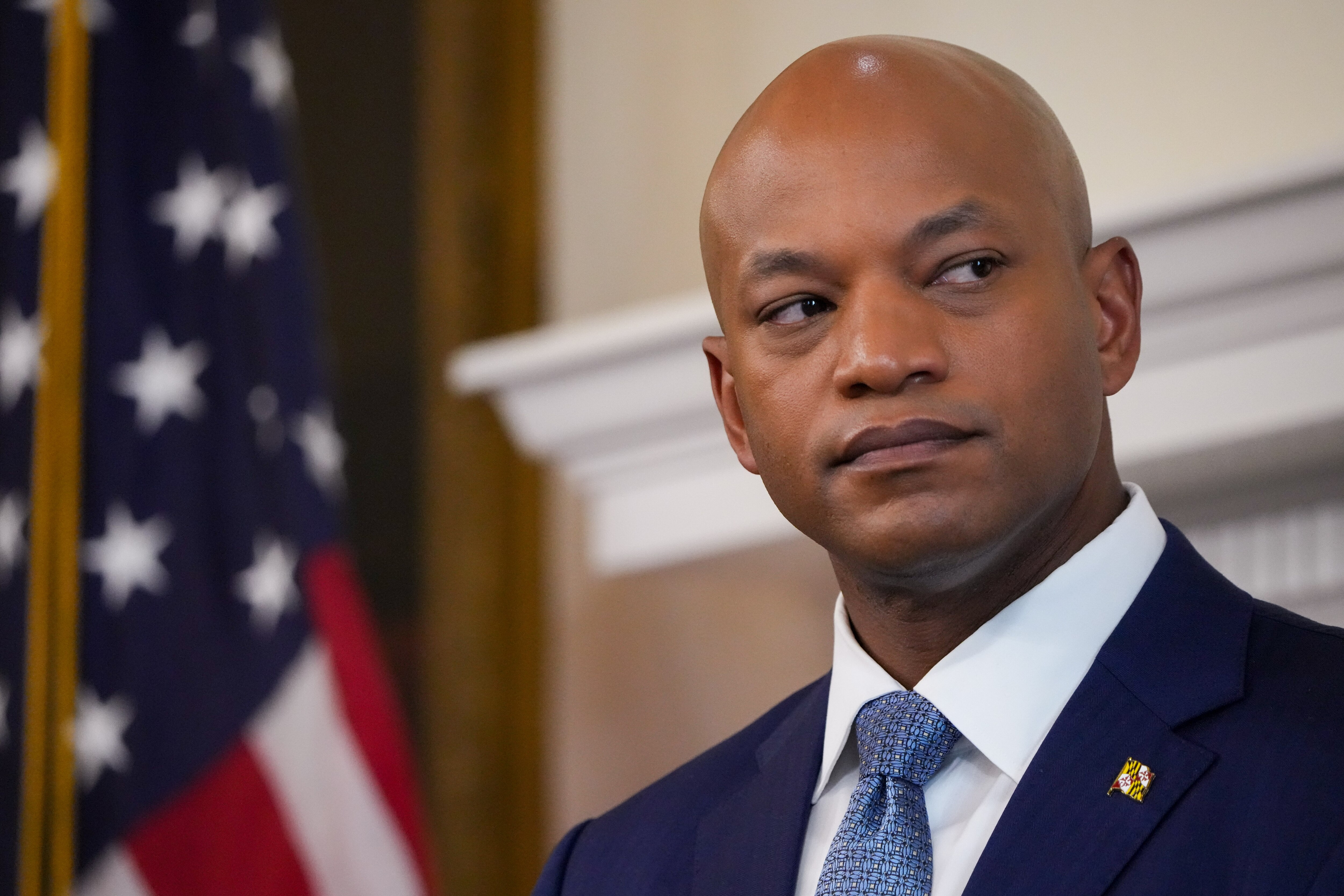 Maryland Gov. Wes Moore takes questions during a news conference in the Maryland State House on June 20, 2024. Moore’s administration announced nearly $150 million in budget cuts Wednesday to pay for expected growth in health care and child care programs.