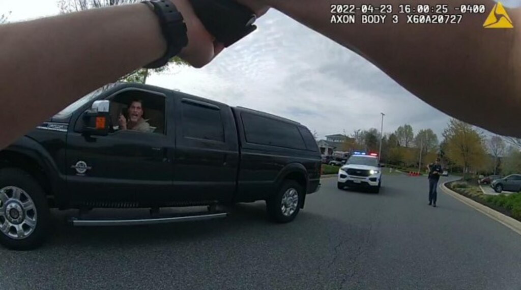 John Fauver talks on his cell phone with Harford County Deputy Sheriff Francis Sullivan on April 23, 2022. A few minutes later Sgt. Bradford Sives killed him with his shotgun when he got out of the truck and pointed what turned out to be a cane.