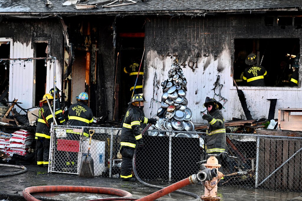 Baltimore City Fire Department crews respond to a blaze at Falkenhan’s Hardware in Hampden on Dec. 15, 2025.