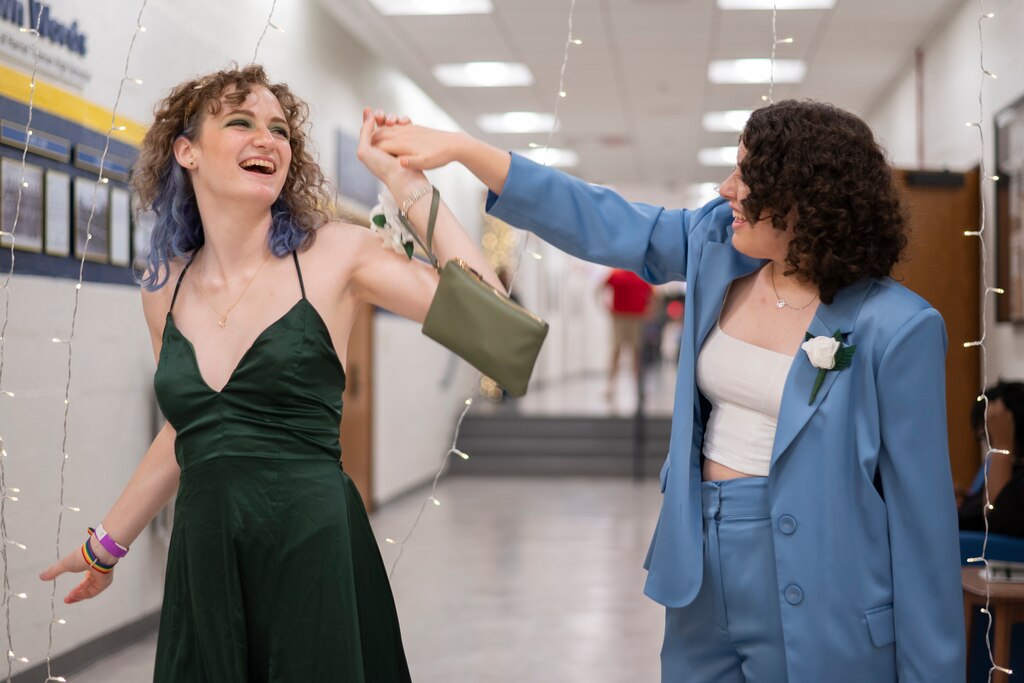Gweneth Watshon, 18, and Rebecca Lassman, 19, pose for a portrait during Pride Prom at the Harriet Tubman Cultural Center in Columbia, MD on June 10, 2023.