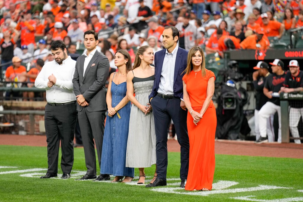 The family of Cal Ripken Jr., including his wife Laura Ripken and son Ryan Ripken, on the field at Oriole Park at Camden Yards in Baltimore, Md., on Saturday, Sept. 6, 2025. Saturday is the 30th Anniversary of Cal Ripken Jr.’s achievement to play 2,131 games in a row, breaking Lou Gehrigh’s record, and cementing his own place in MLB history as the ‘Iron Man.’