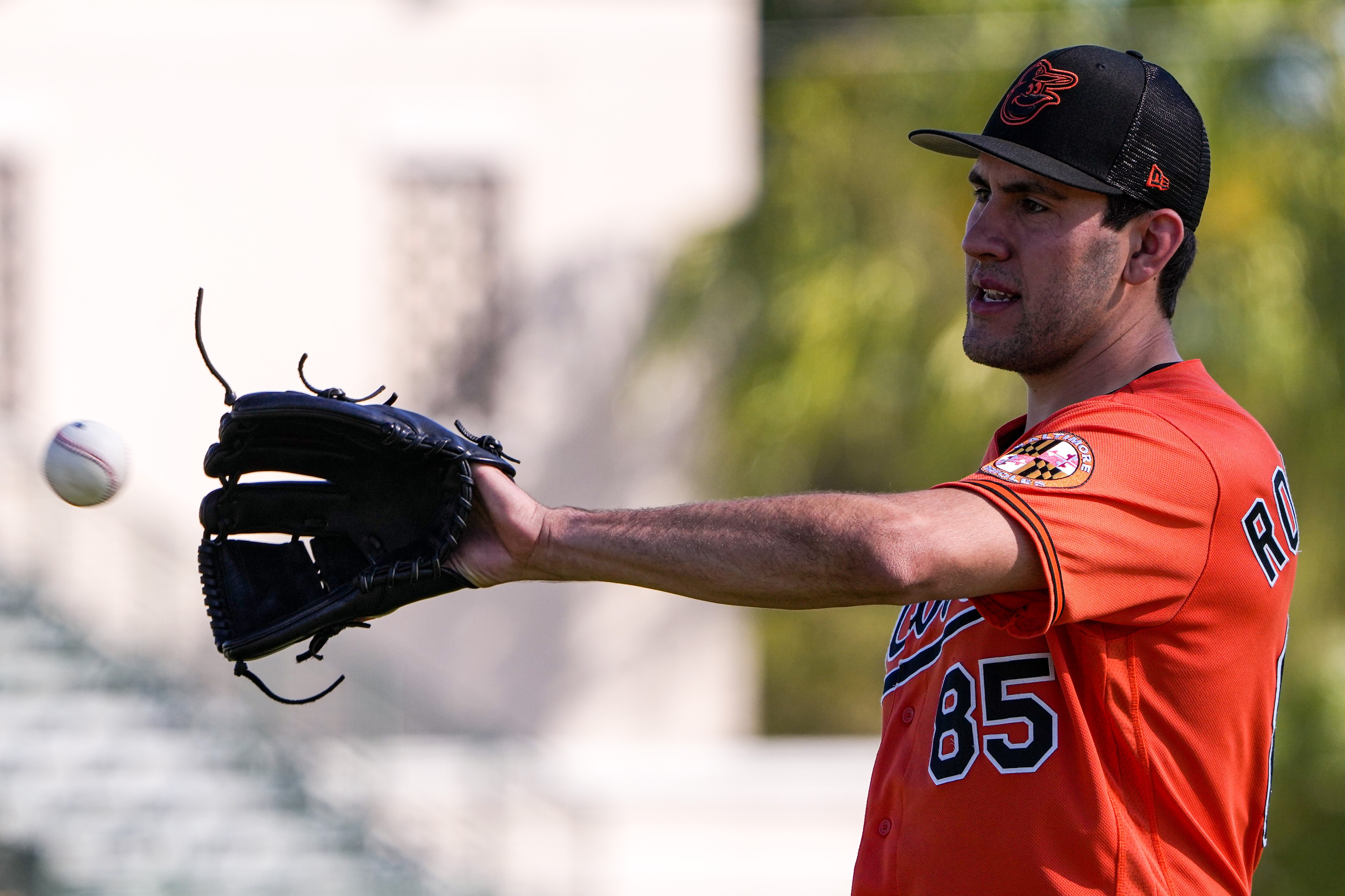 Orioles pitcher Grayson Rodriguez (85) catches a ball during practice at Ed Smith Stadium in Sarasota on 2/22/23. The Baltimore Orioles’ Spring Training session runs from mid-February through the end of March.