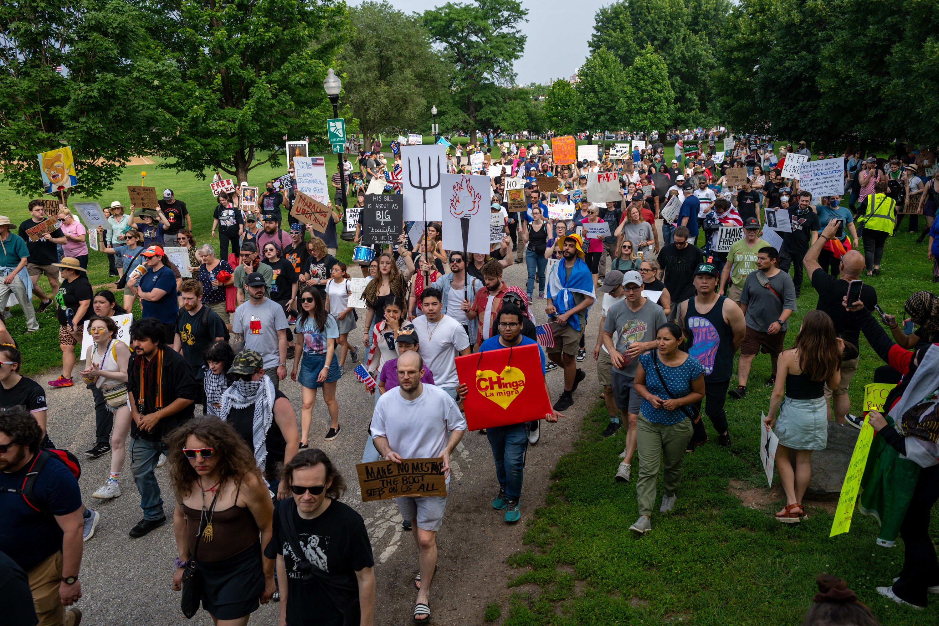 Protesters march around Patterson Park in Baltimore on Saturday, during one of many "No Kings" protests being held around the country.