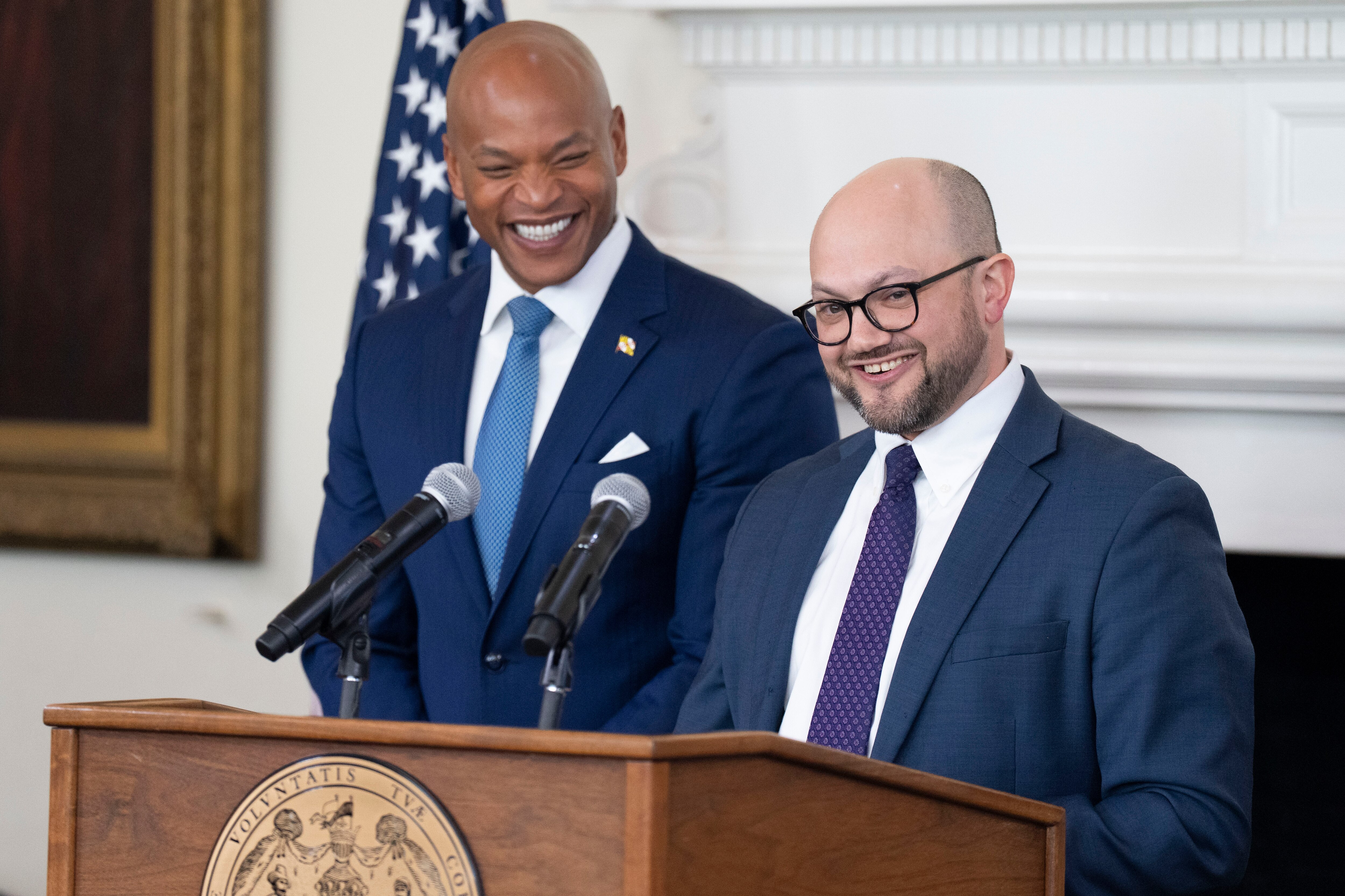 Gov. Wes Moore and acting Budget Secretary Jake Weissmann speak during Wednesday’s announcement of the fiscal year 2027 budget proposal.
