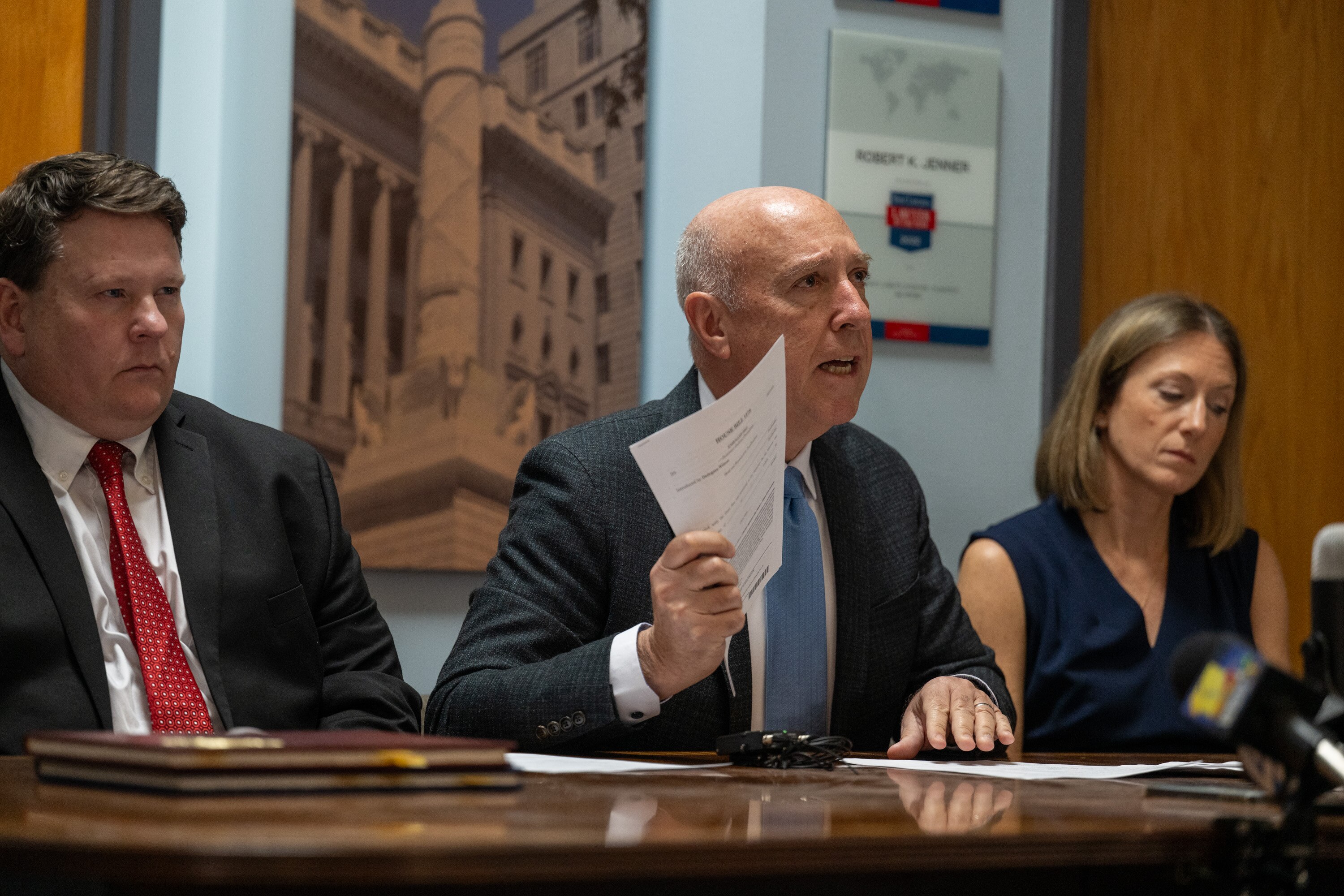 Attorney Robert Jenner, center, called on Gov. Wes Moore to veto legislation that would slash what survivors of childhood sexual abuse can win in civil court cases in Maryland.