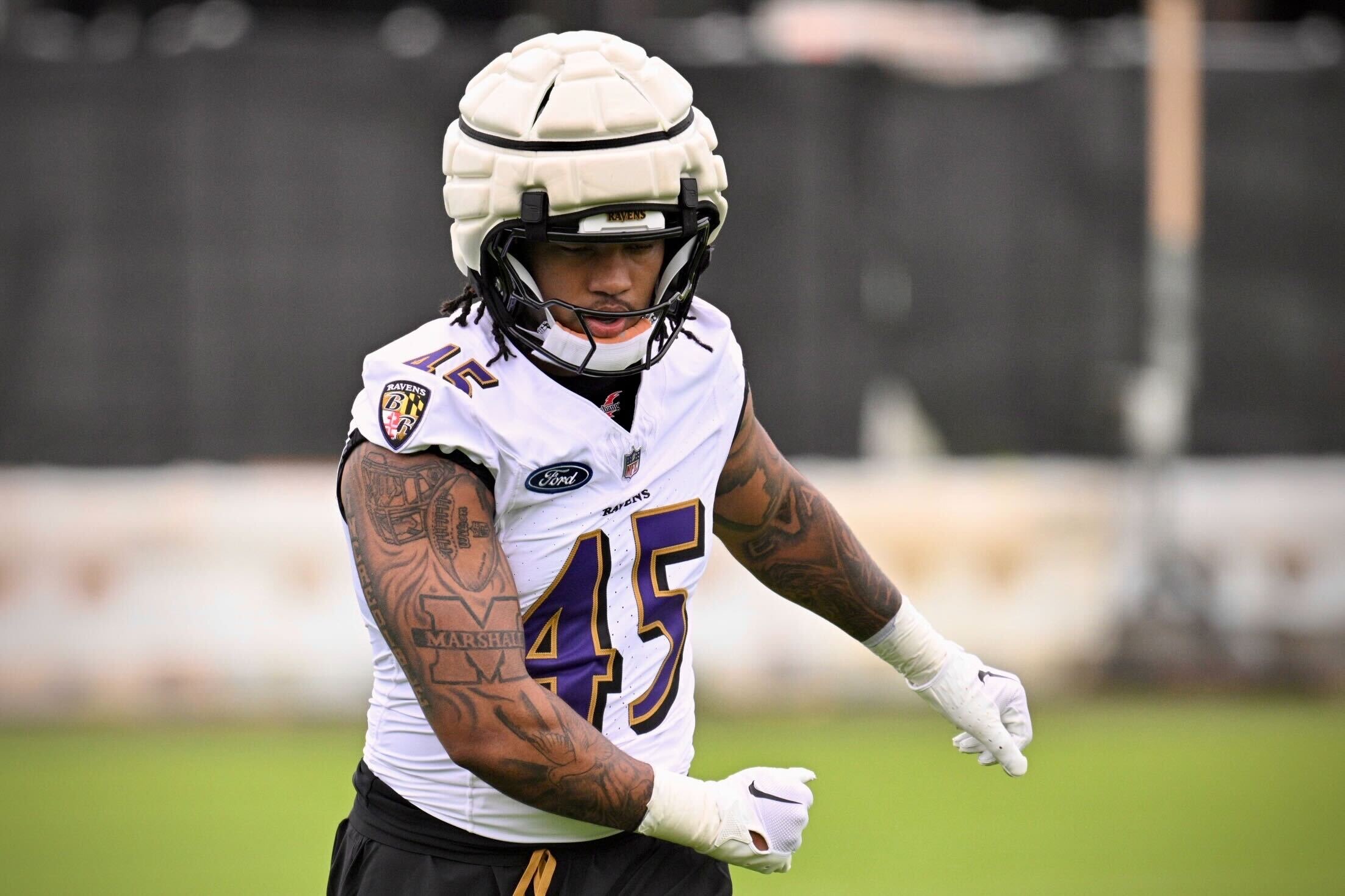 Ravens rookie Mike Green works out during rookie minicamp on May 4.