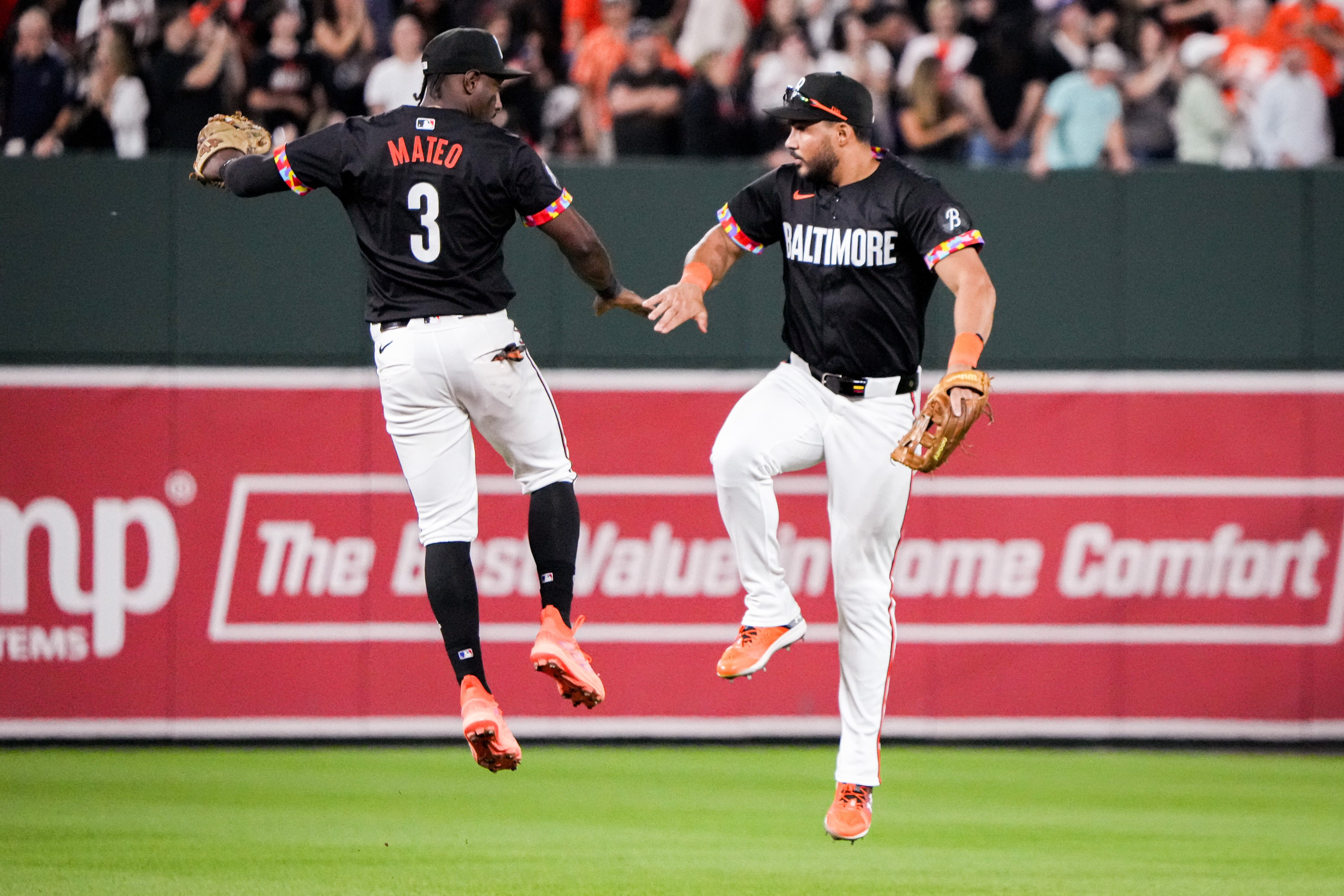 Baltimore Orioles second baseman Jorge Mateo jumps and high fives Anthony Santander after beating the Tampa Bay Rays at Camden Yards on Friday, May 30.