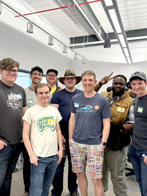 Several current and ex-Firaxians at an open laptop night hosted by MICA in 2024.