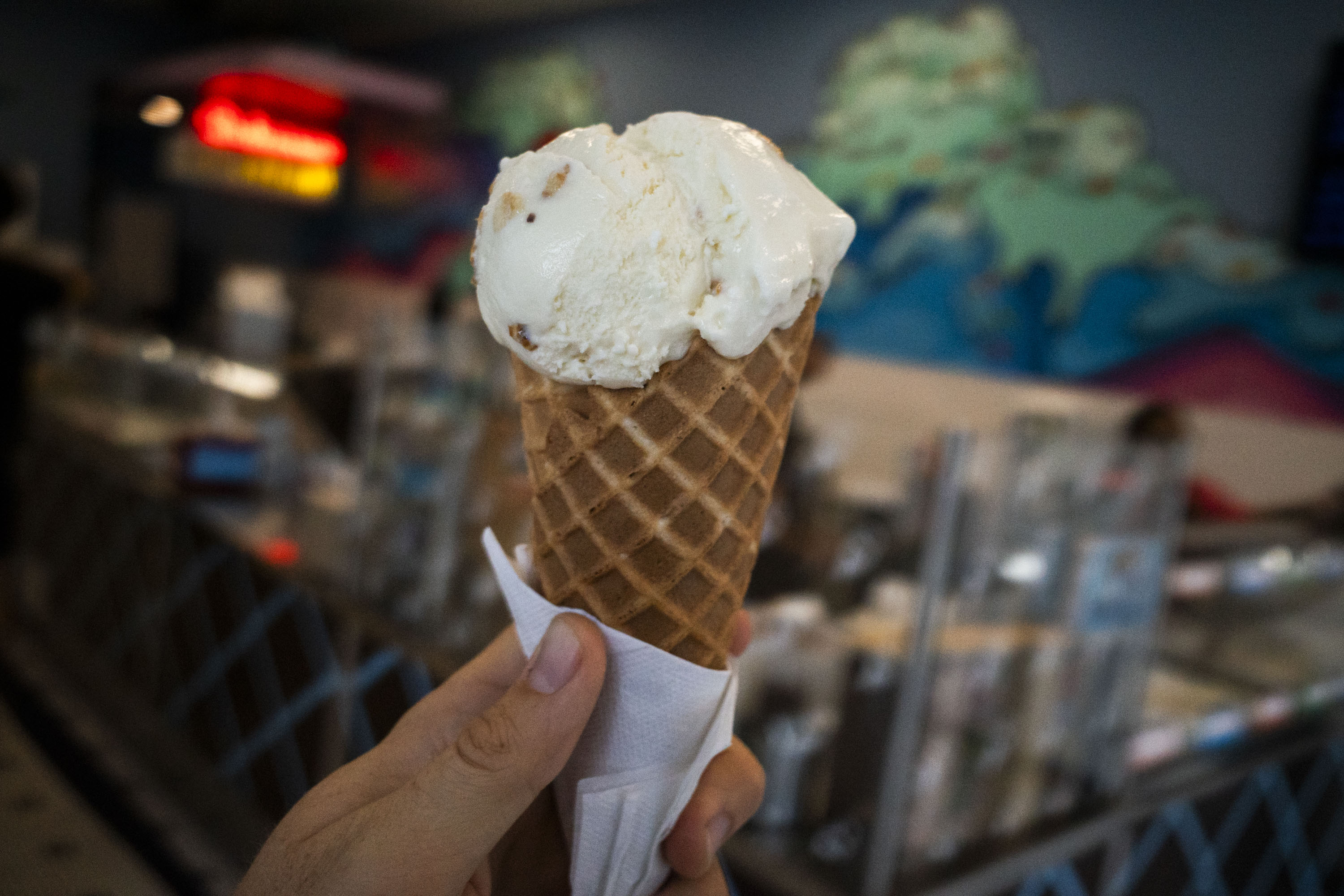 A Charmery waffle cone stuffed with the flavor "Golden" is puffed wheat cereal and caramelized honey.