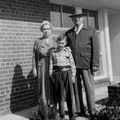 Lee Hudson as a child with his parents outside their home in Springfield, VA during the 1950s. L-R, Edna Hudson, Lee Hudson and Don Hudson.