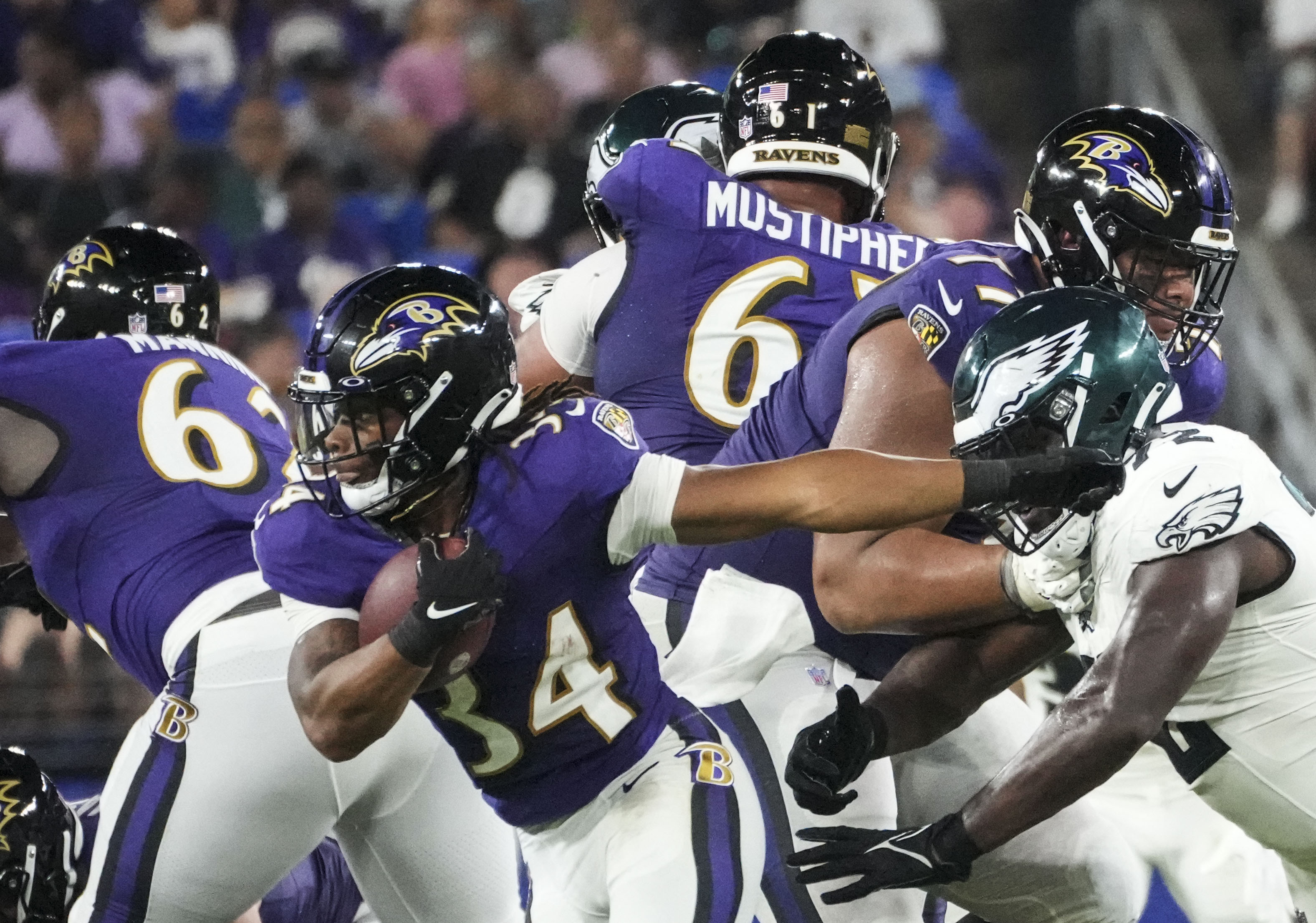 Baltimore Ravens running back Keaton Mitchell (34) makes his way down the field against Philadelphia Eagles during a preseason game at M&T Bank Stadium on Saturday, August 12, 2023.