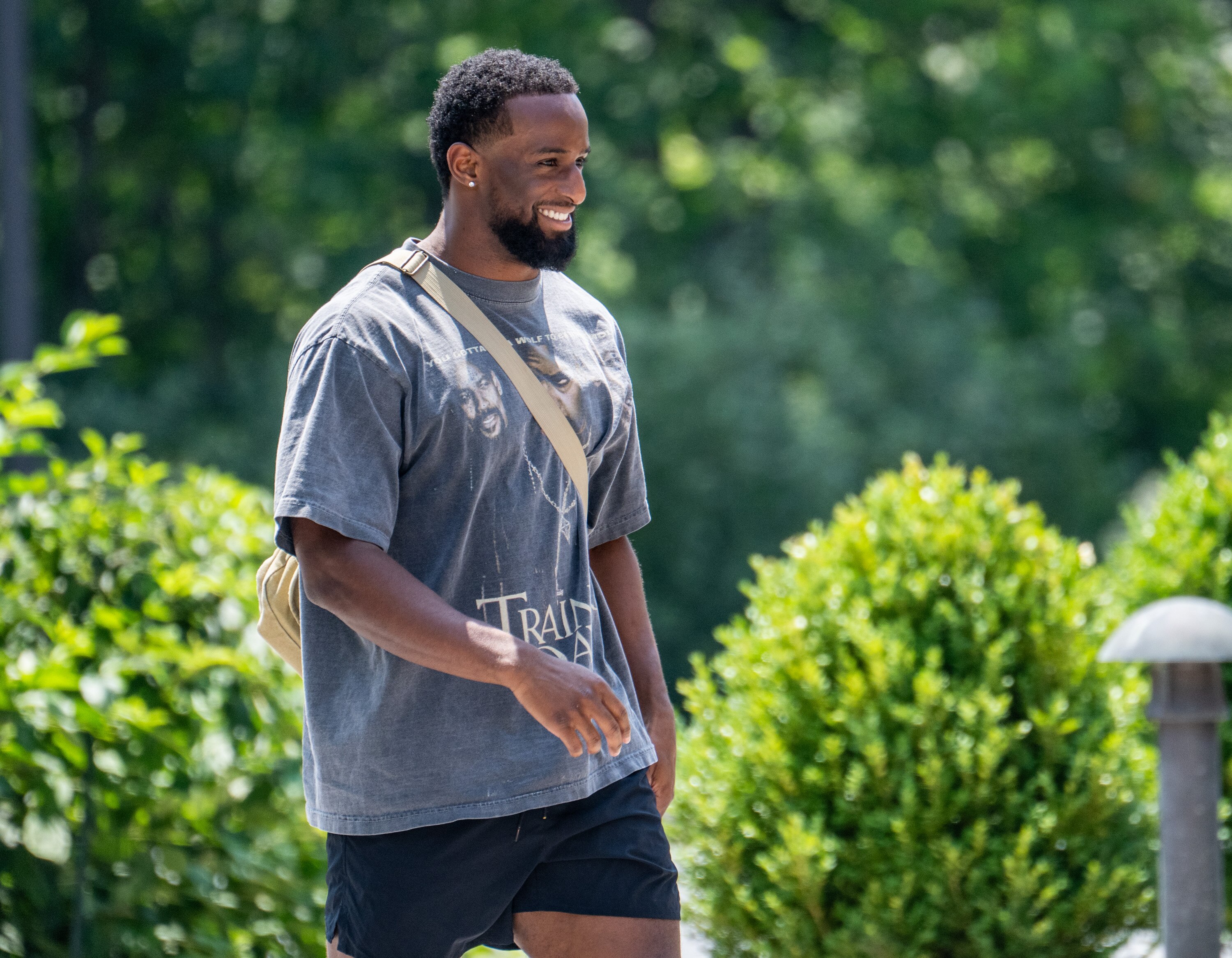 Running back Justice Hill arrives at the Ravens training facility for the first day of training camp. He's one of many talented players who will be fighting for touches on offense.