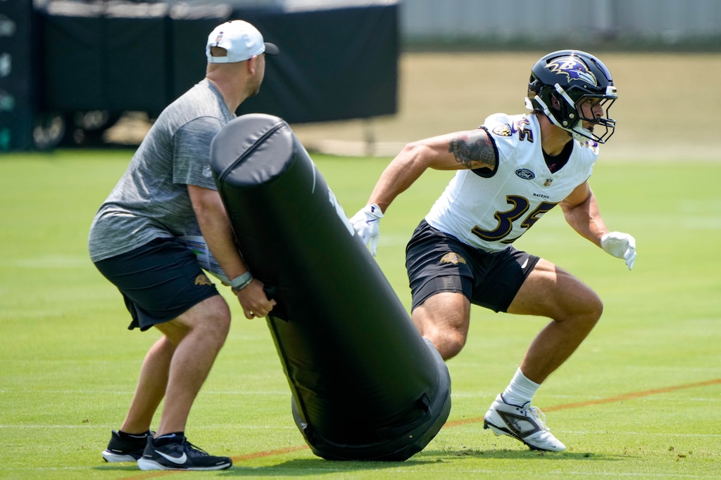 Baltimore Ravens linebacker Jacob Hummel (35) runs a drill during the Ravens’ organized team activities at the Under Armour Performance Center in Owings Mills, Md. on Wednesday, June 11, 2025.