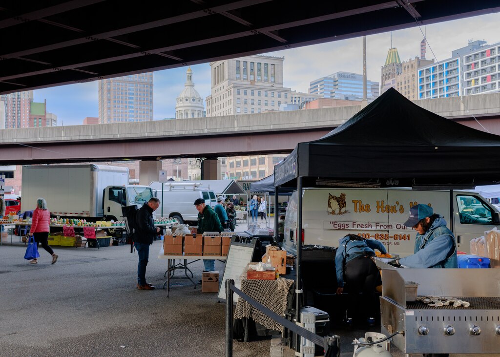 Vendors display their wares at the Baltimore Farmer’s Market in downtown Baltimore on April 13, 2025.