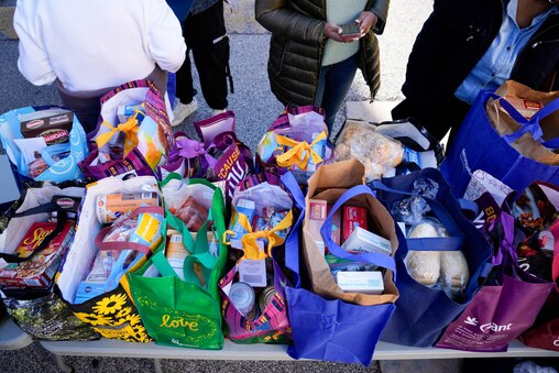 Bags of food ready to hand out to local residents during a Thanksgiving holiday meal giveaway at Trinity Episcopal Church in Towson, Md., on Monday, November 24, 2025. The Assistance Center of Towson Churches organized the event, which was also held in 2024.