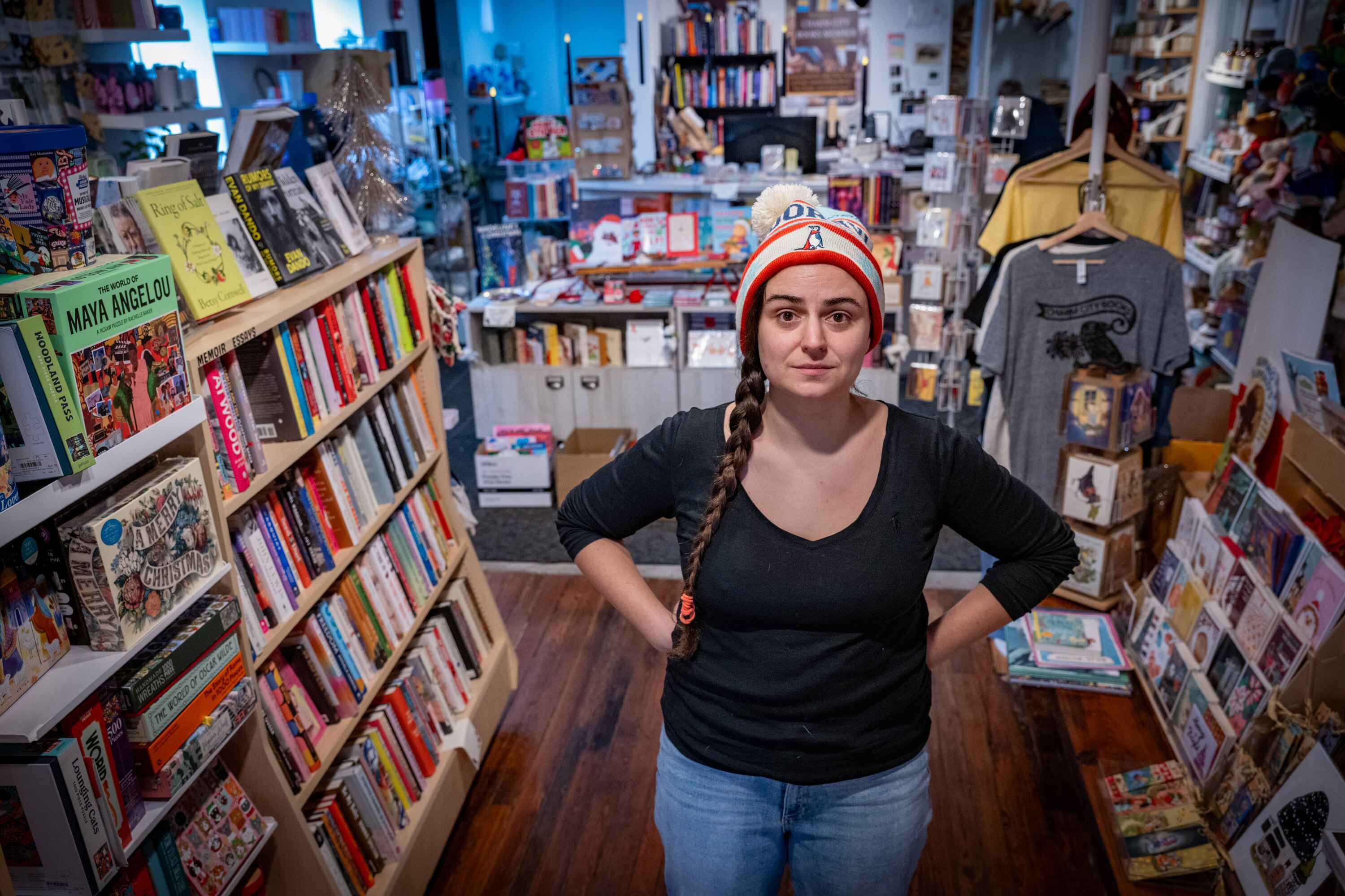 Daven Ralston owns Charm City Books with her husband Joseph Carlson. The couple are facing a big jump in the cost of their family health insurance through the exchange because of lost federal subsidies. 